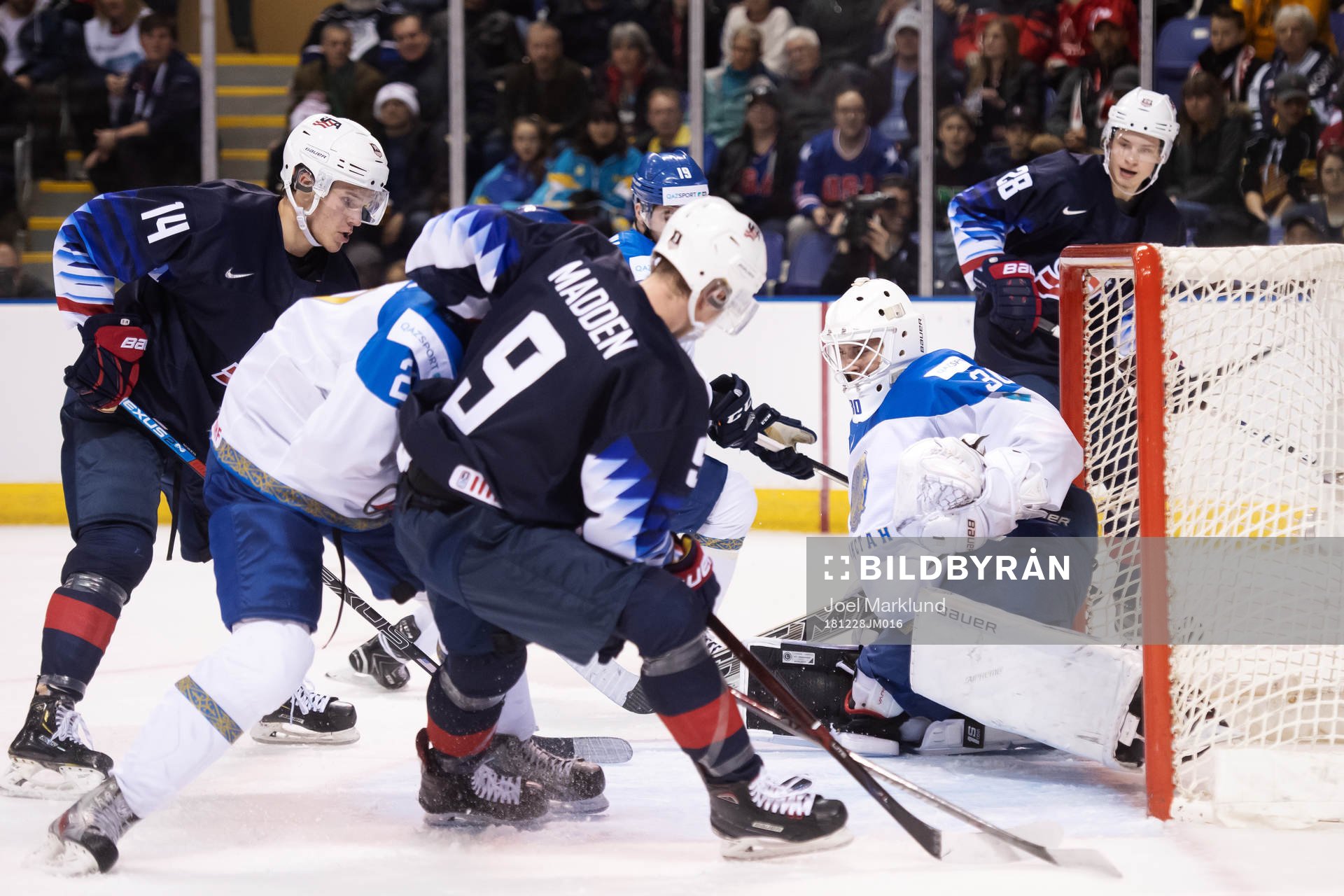 Josh Norris, Tyler Madden and Joel Farebee of USA attacking