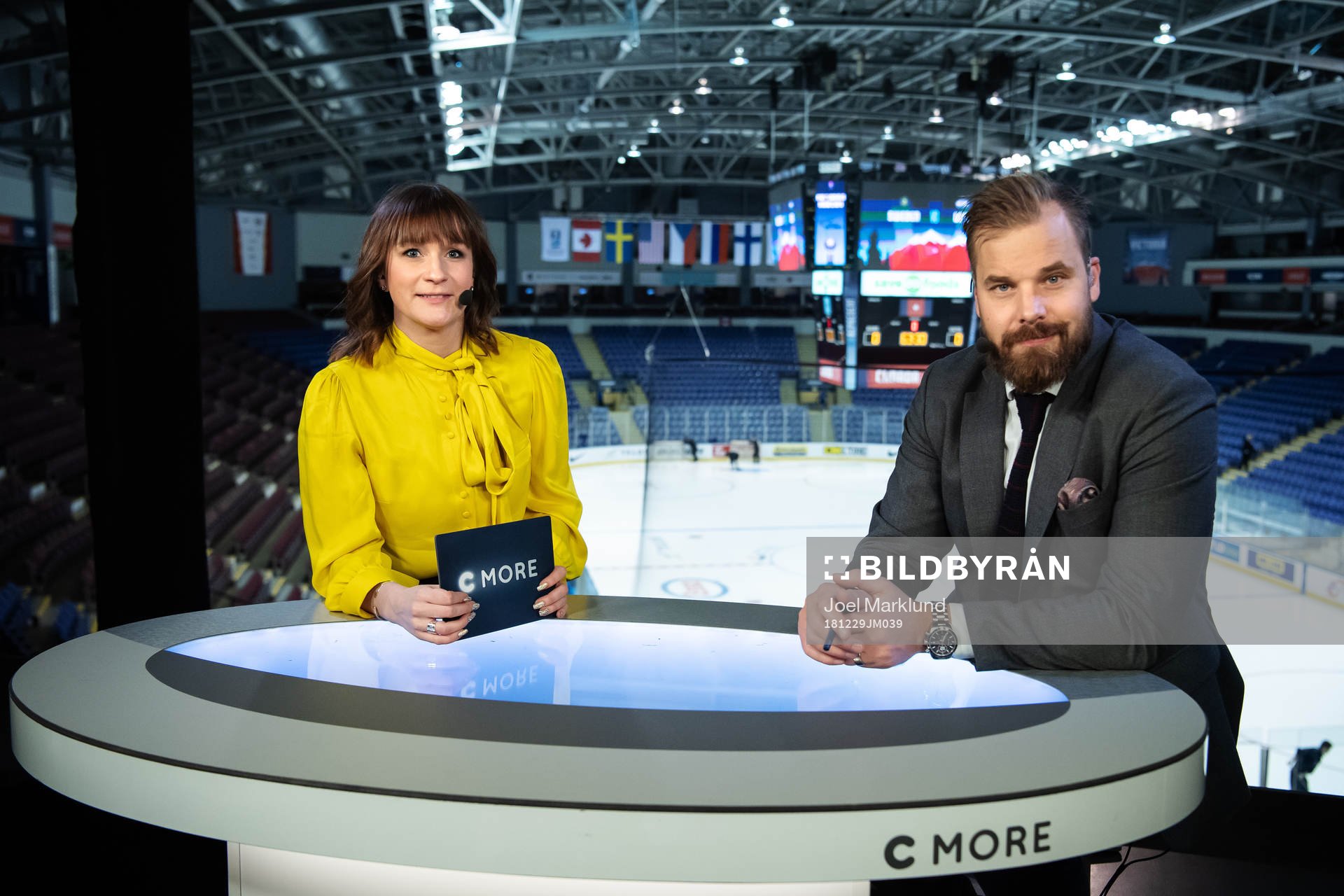 TV commentators Lena Sundqvist and Sanny Lindström in the