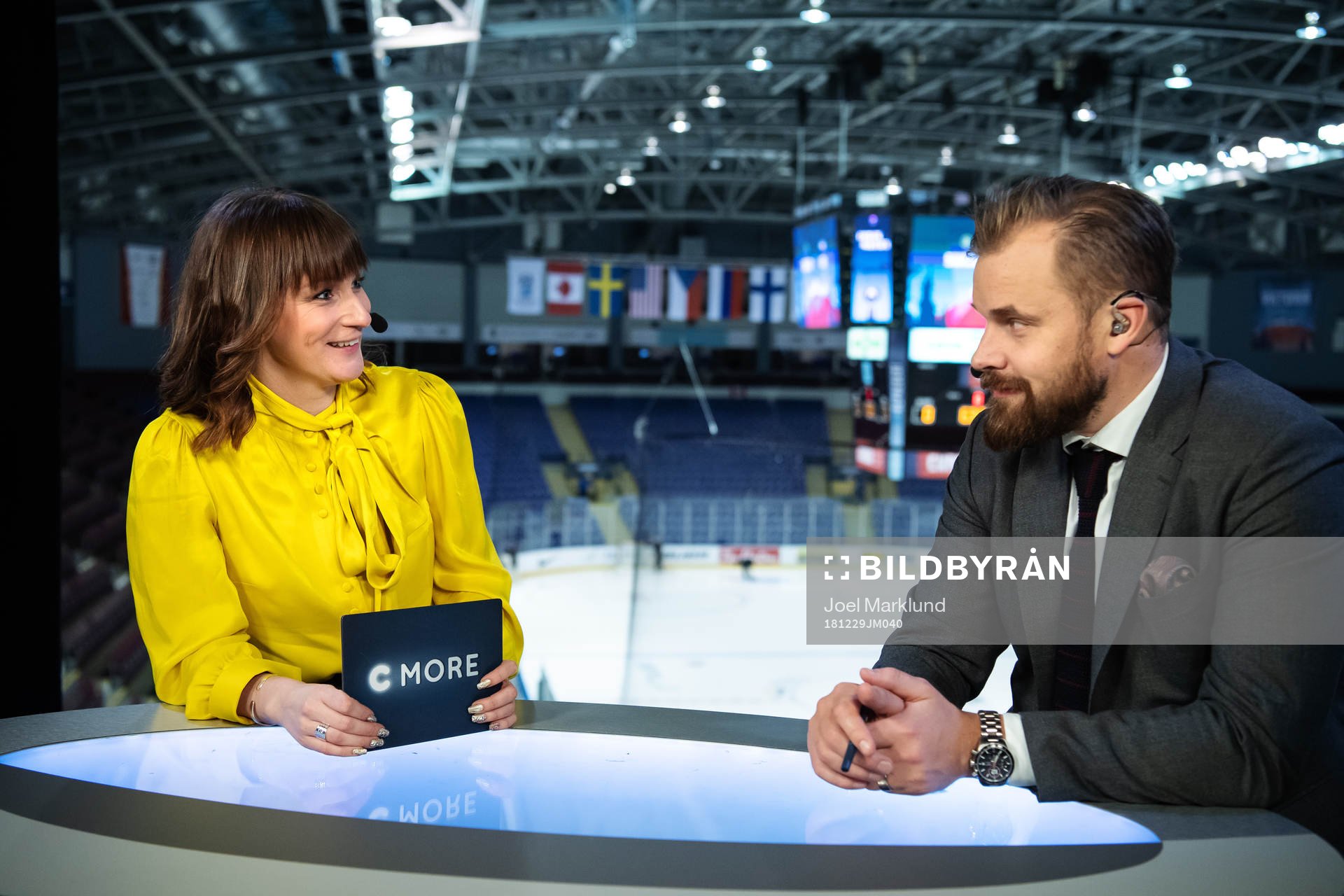 TV commentators Lena Sundqvist and Sanny Lindström in the
