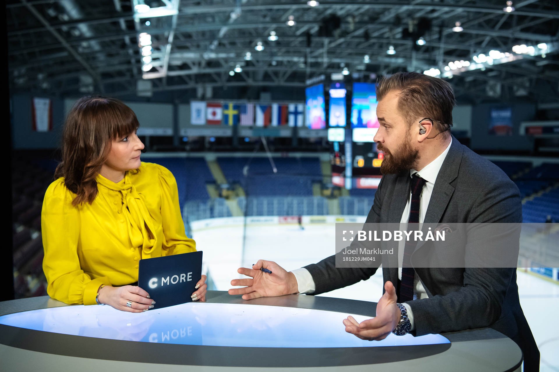 TV commentators Lena Sundqvist and Sanny Lindström in the