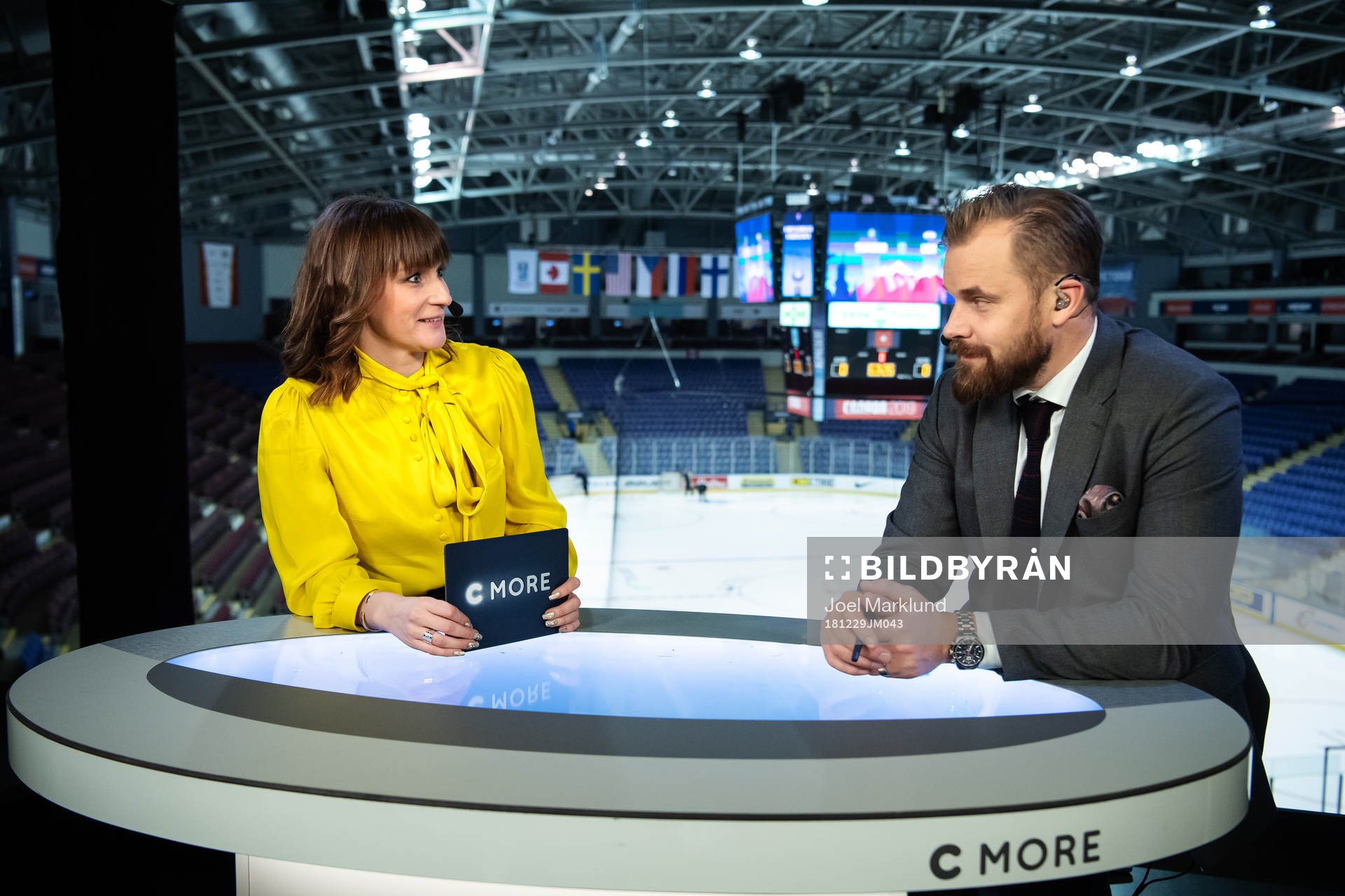 TV commentators Lena Sundqvist and Sanny Lindström in the