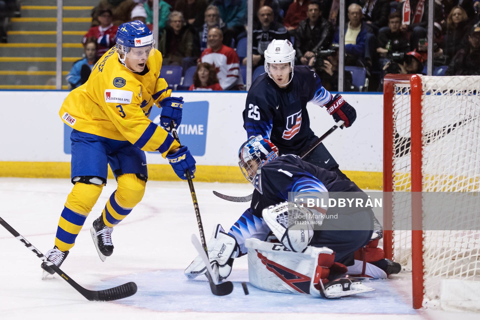 Adam Boqvist of Sweden in action against goaltender Kyle