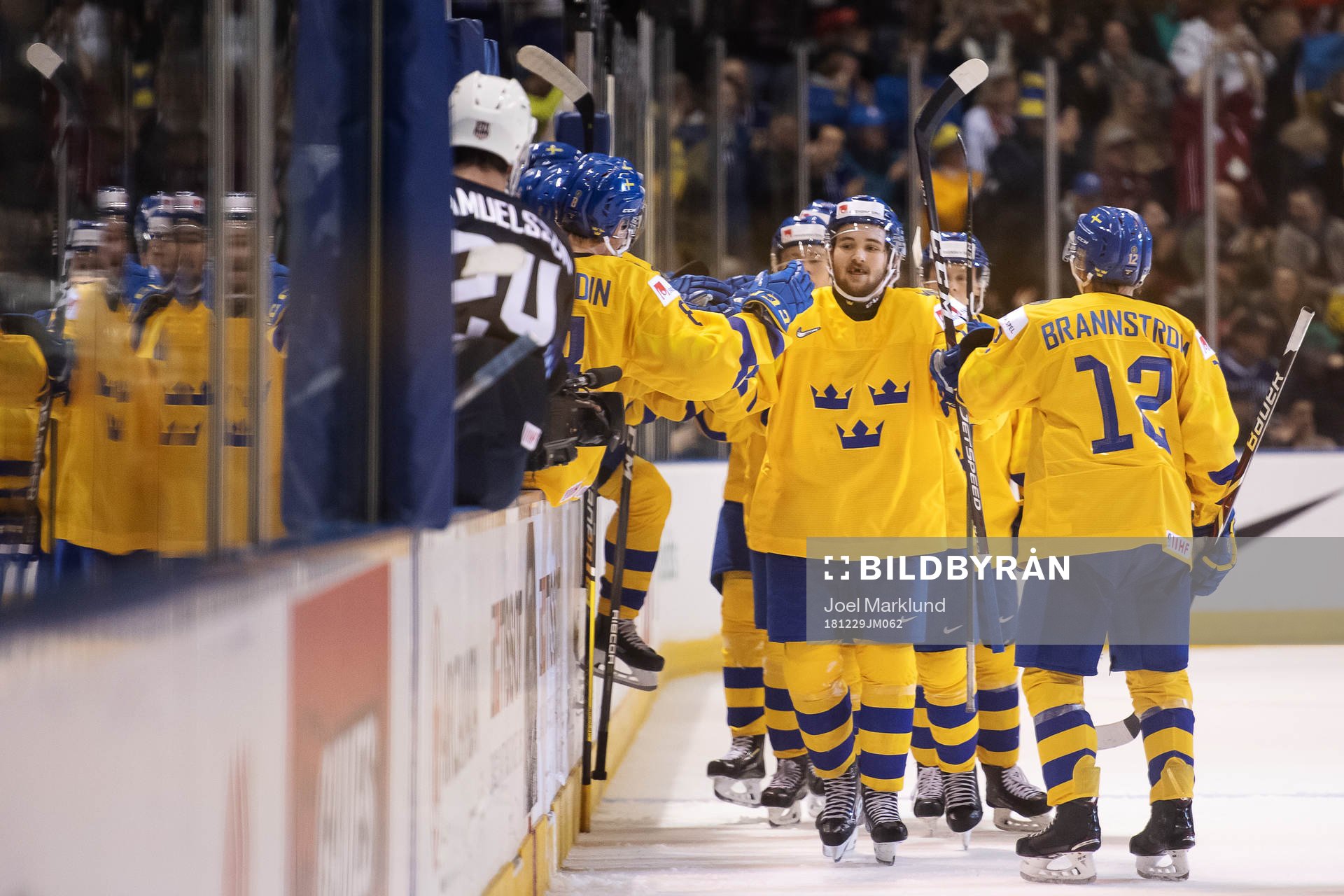 Emil Bemström of Sweden celebrates with teammates