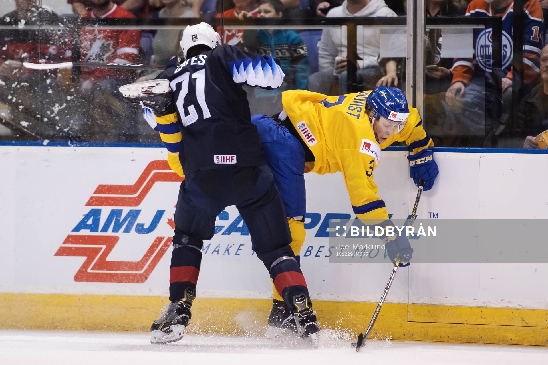 Noah Cates of USA tackles Adam Boqvist of Sweden