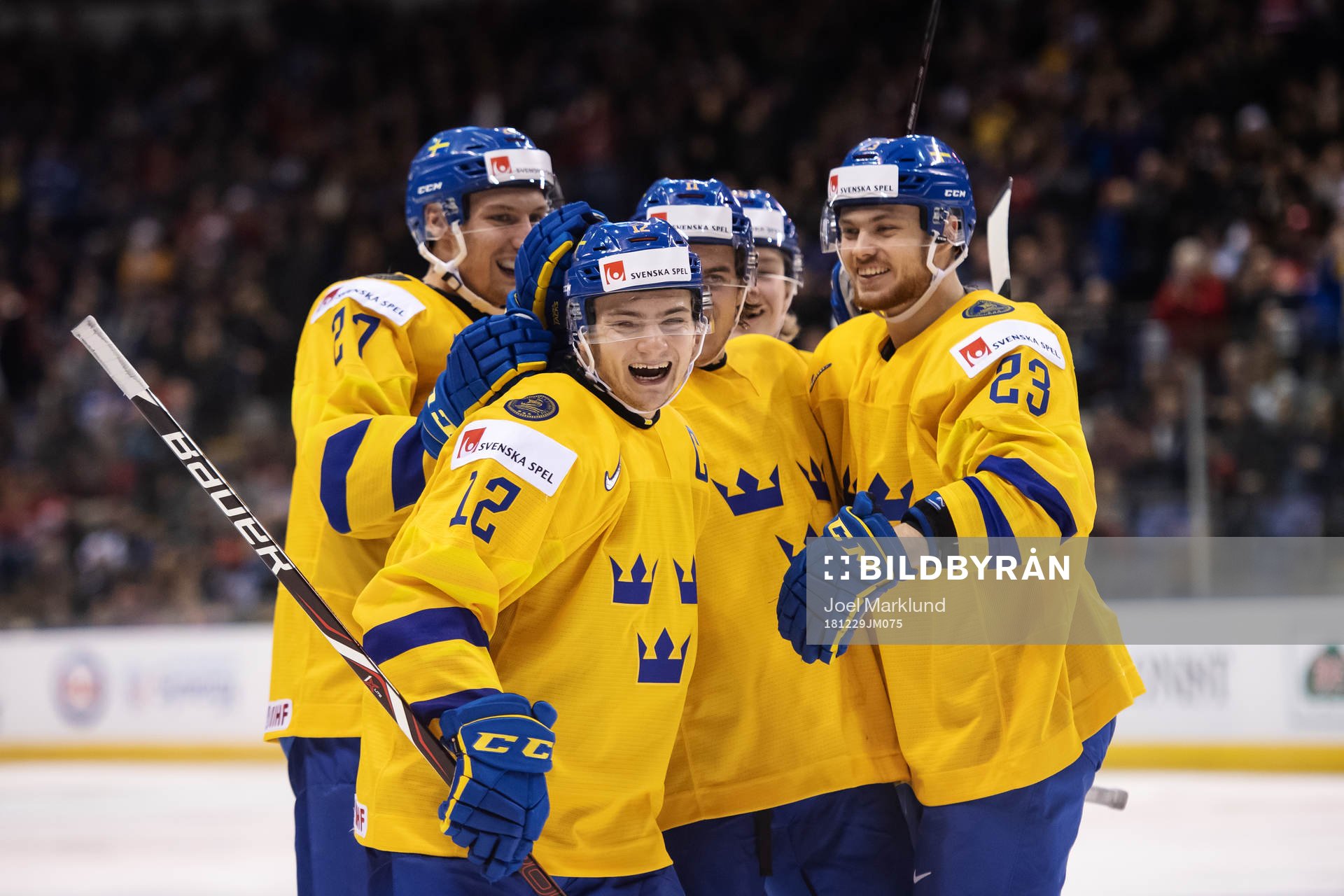 Erik Brännström of Sweden celebrates with teammates