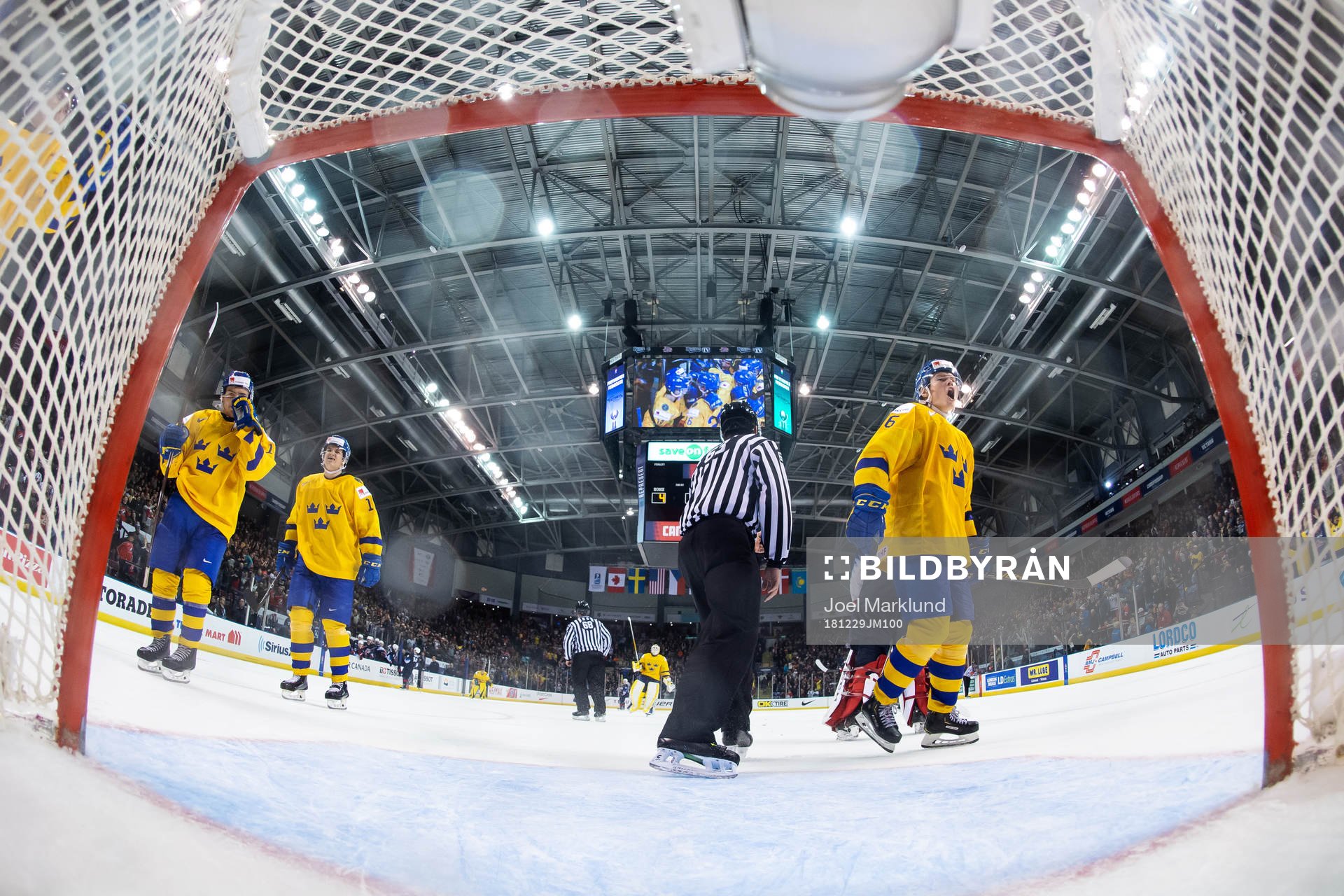 Filip Westerlund (R) of Sweden celebrates the game winning
