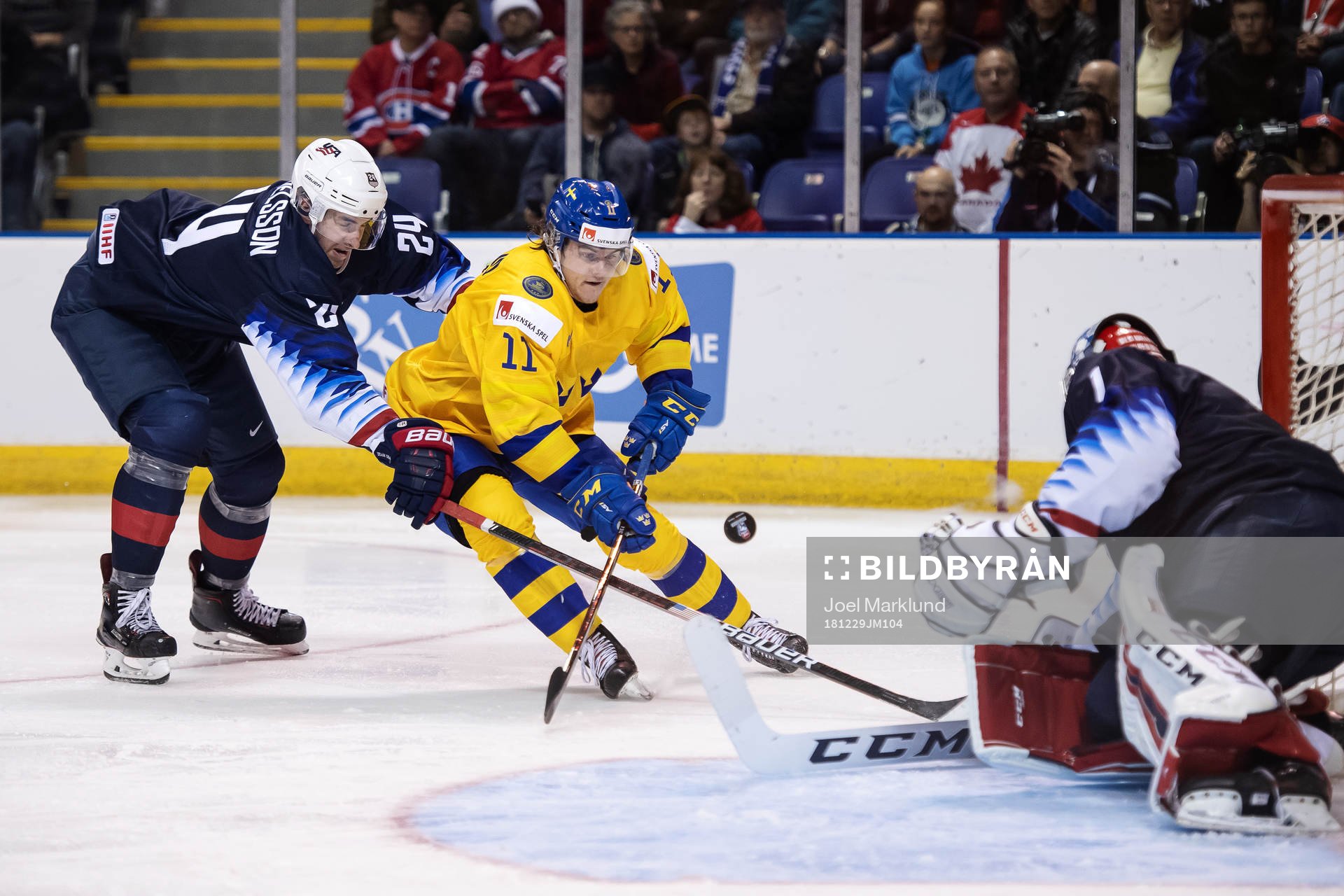 Mattias Samuelsson of USA is being challenged by Samuel