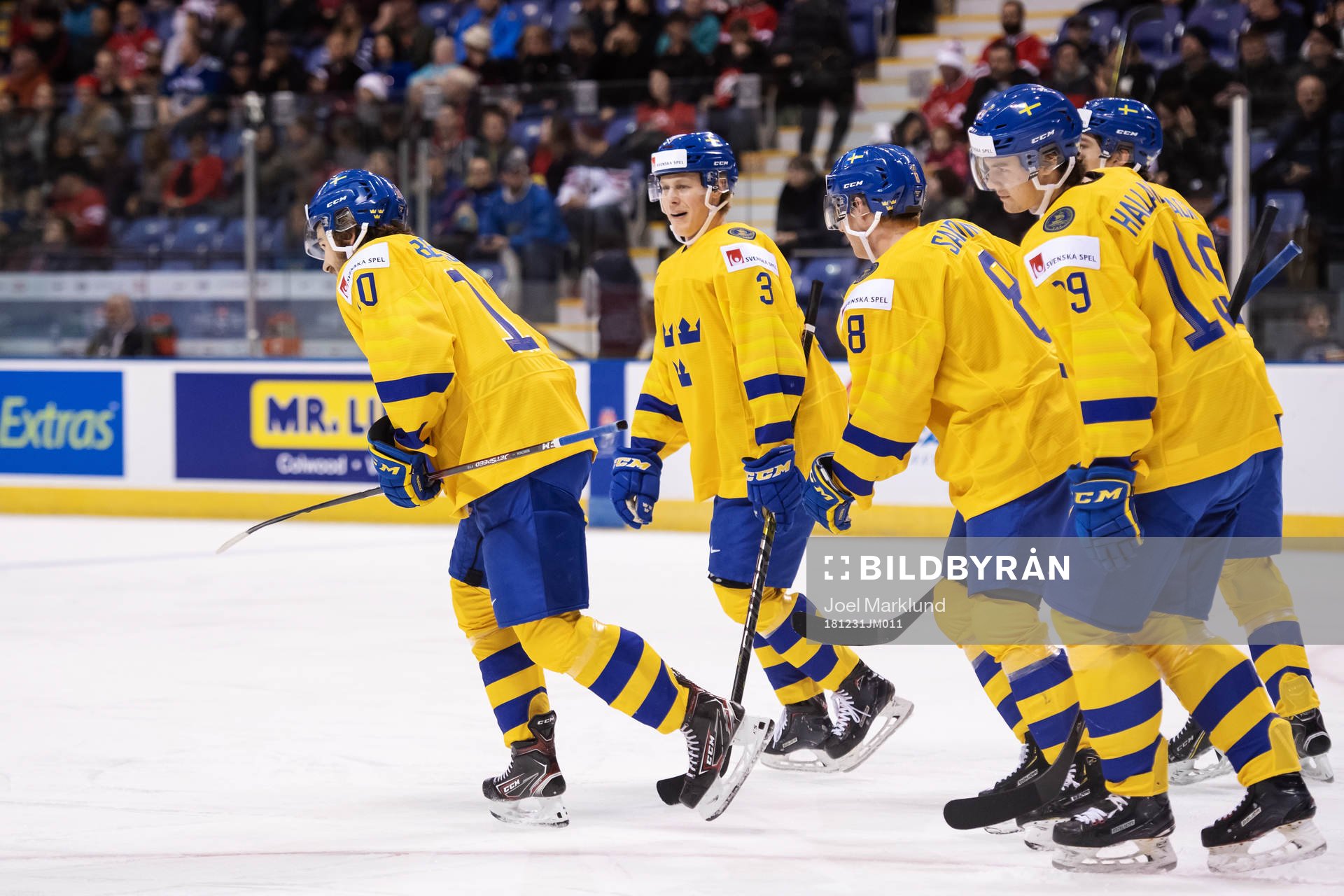 Emil Bemström (L) of Sweden celebrates with teammates