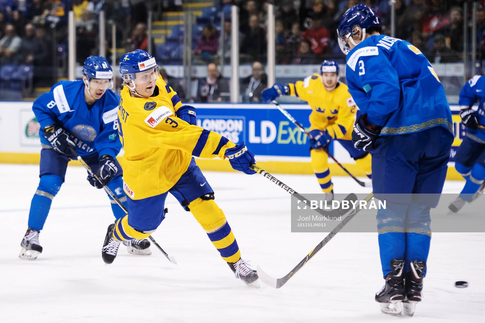 Adam Boqvist of Sweden shoots the puck