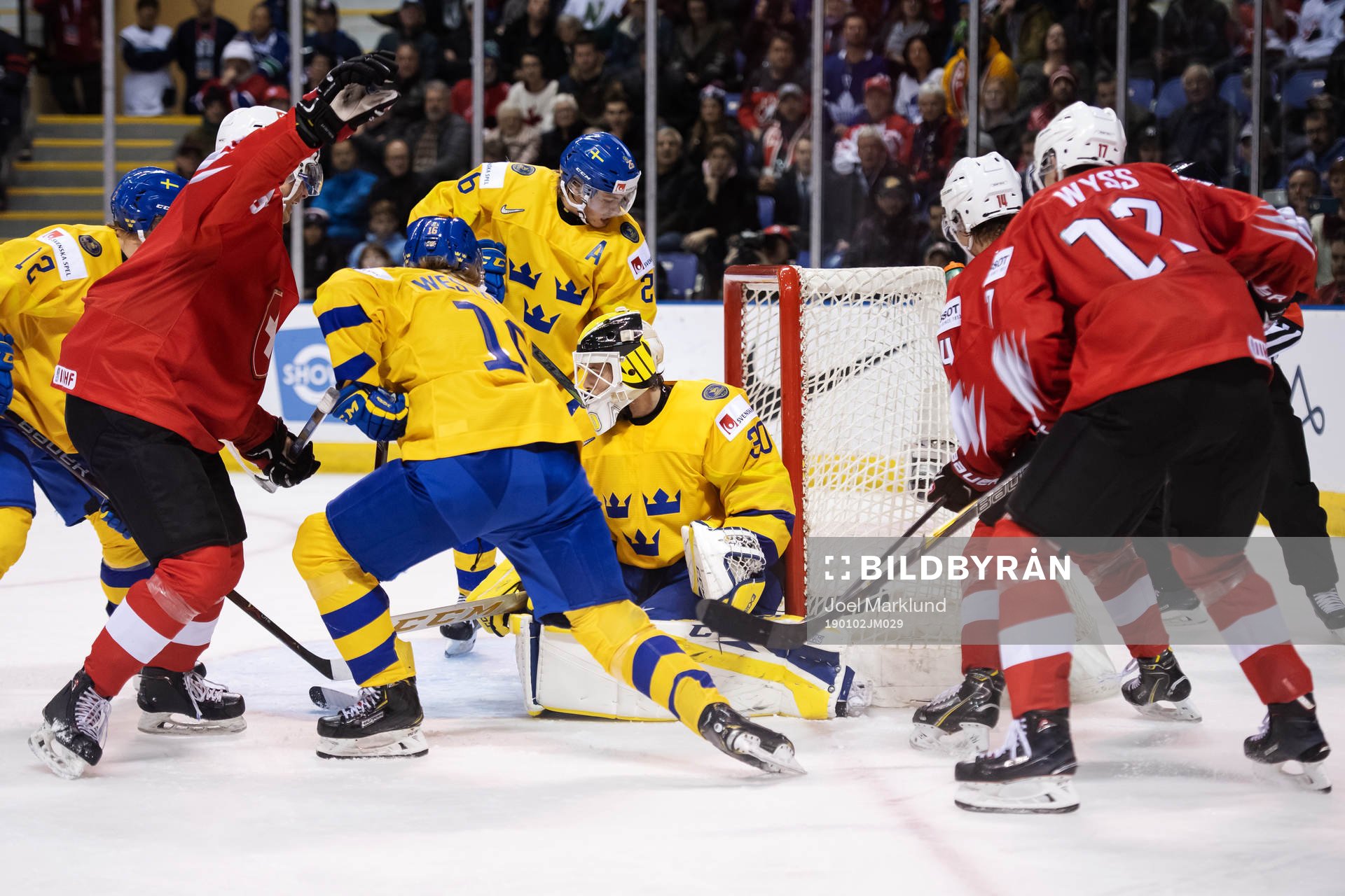 Goaltender Samuel Ersson of Sweden lets in the 0-2 goal
