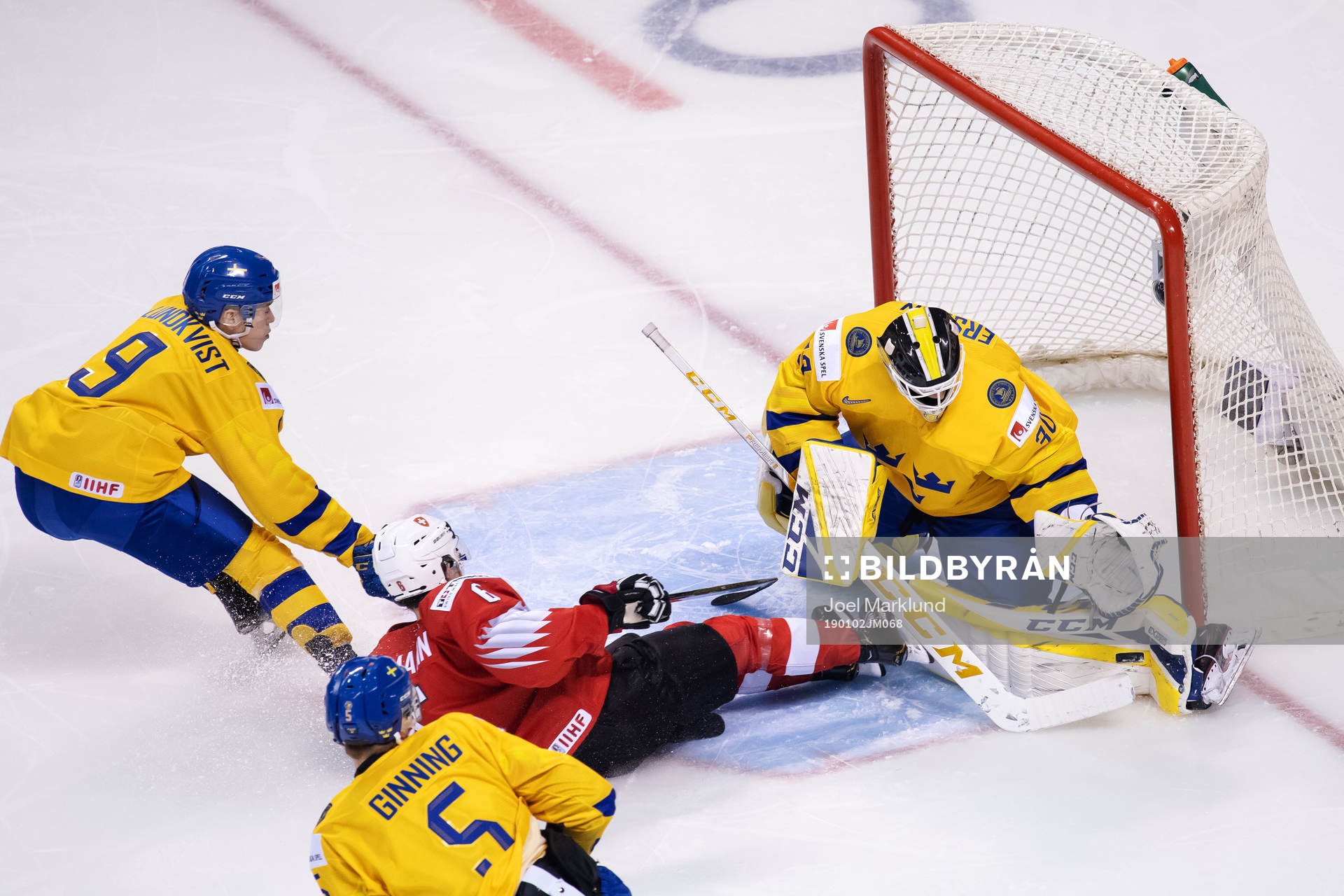 Nils Lundkvist, Adam Ginning and goaltender Samuel Ersson