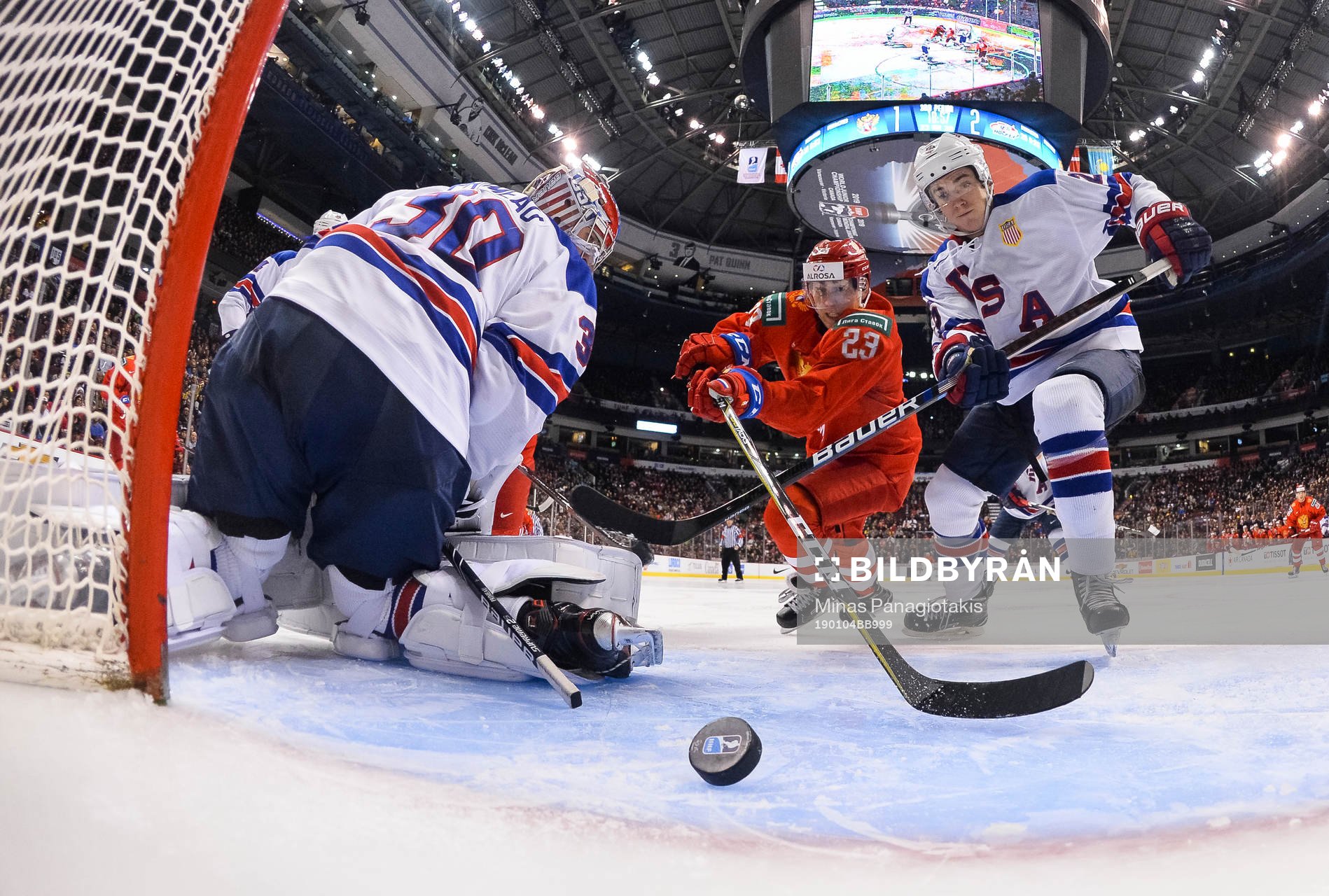 Russia's Ivan Muranov #23 races USA's Phil Kemp #25 for the