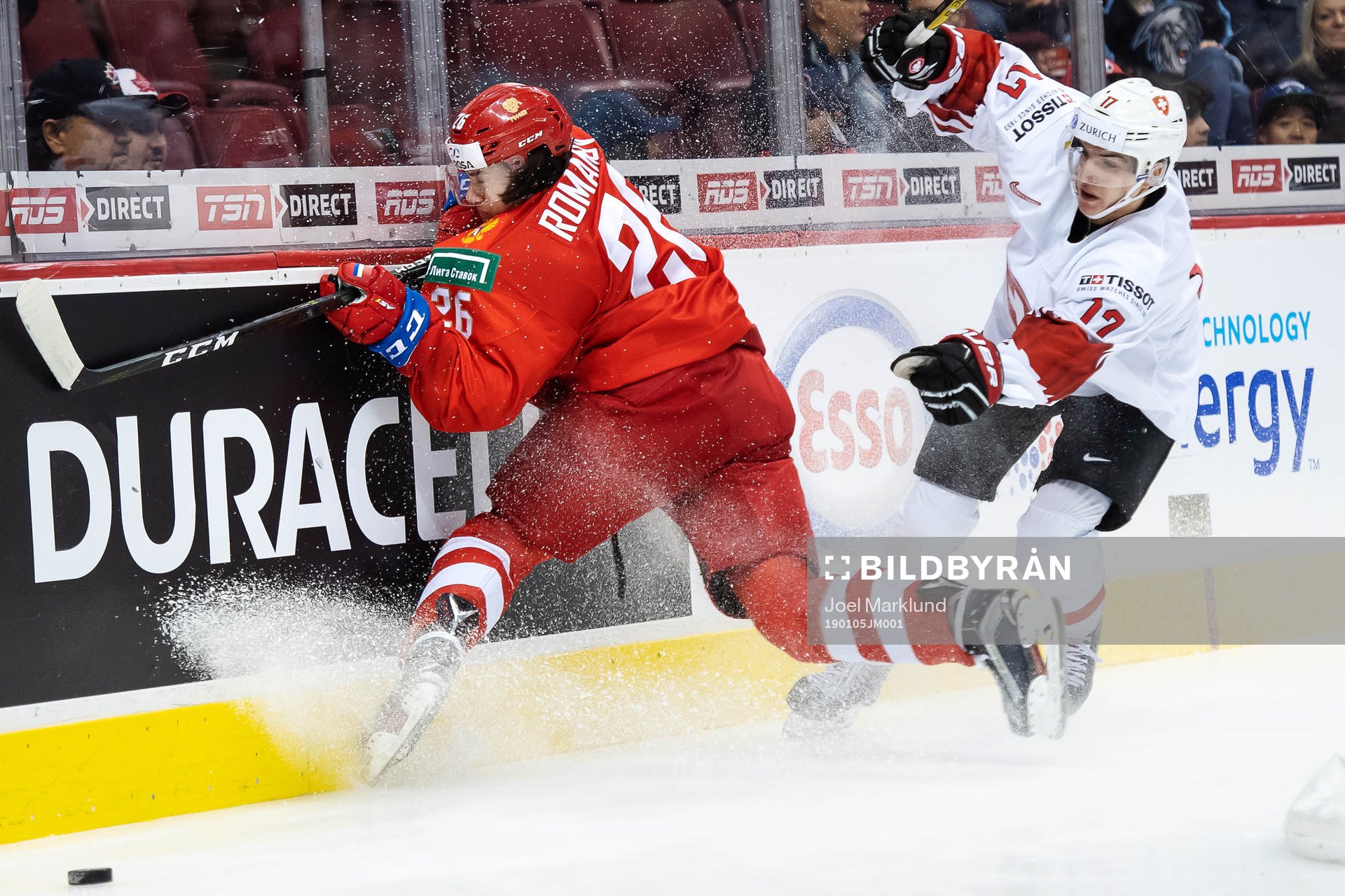 Alexander Romanov of Russia in action against Luca Wyss of