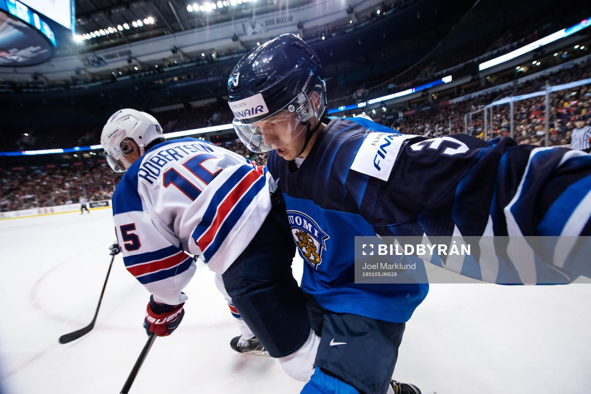 Jason Robertson of USA and Toni Utunen of Finland