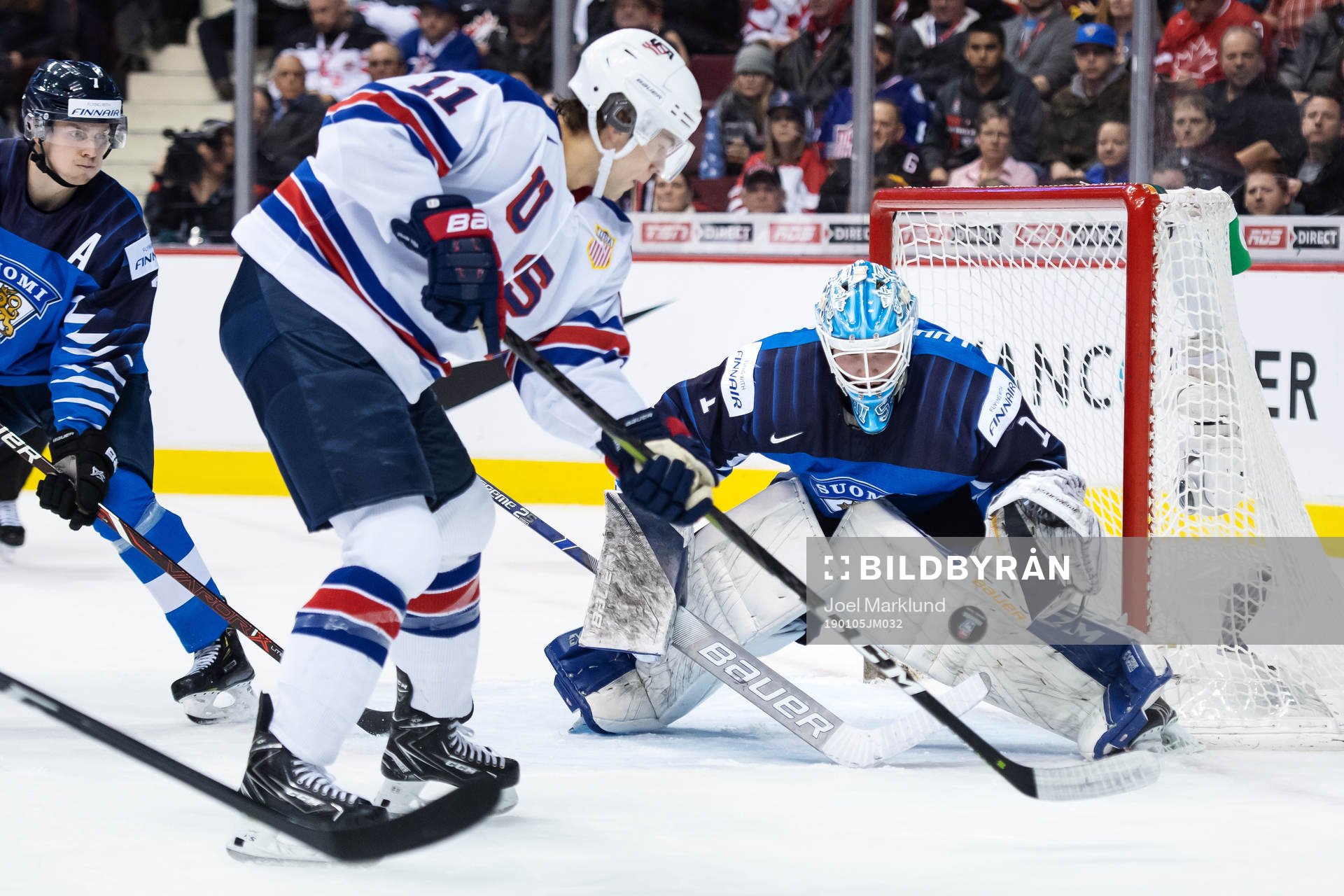 Ryan Poehling of USA shoots at goaltender Ukko-Pekka