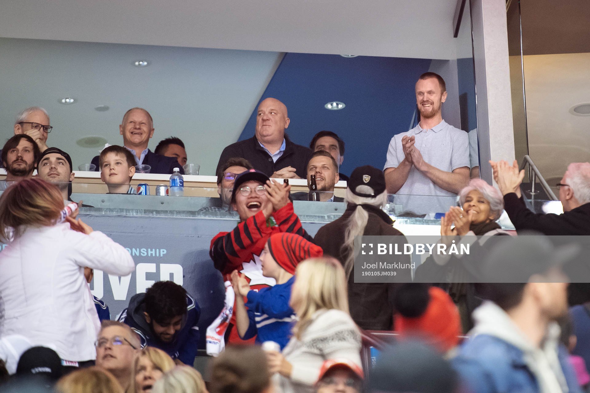 Former Vancouver Canucks player Henrik Sedin is given