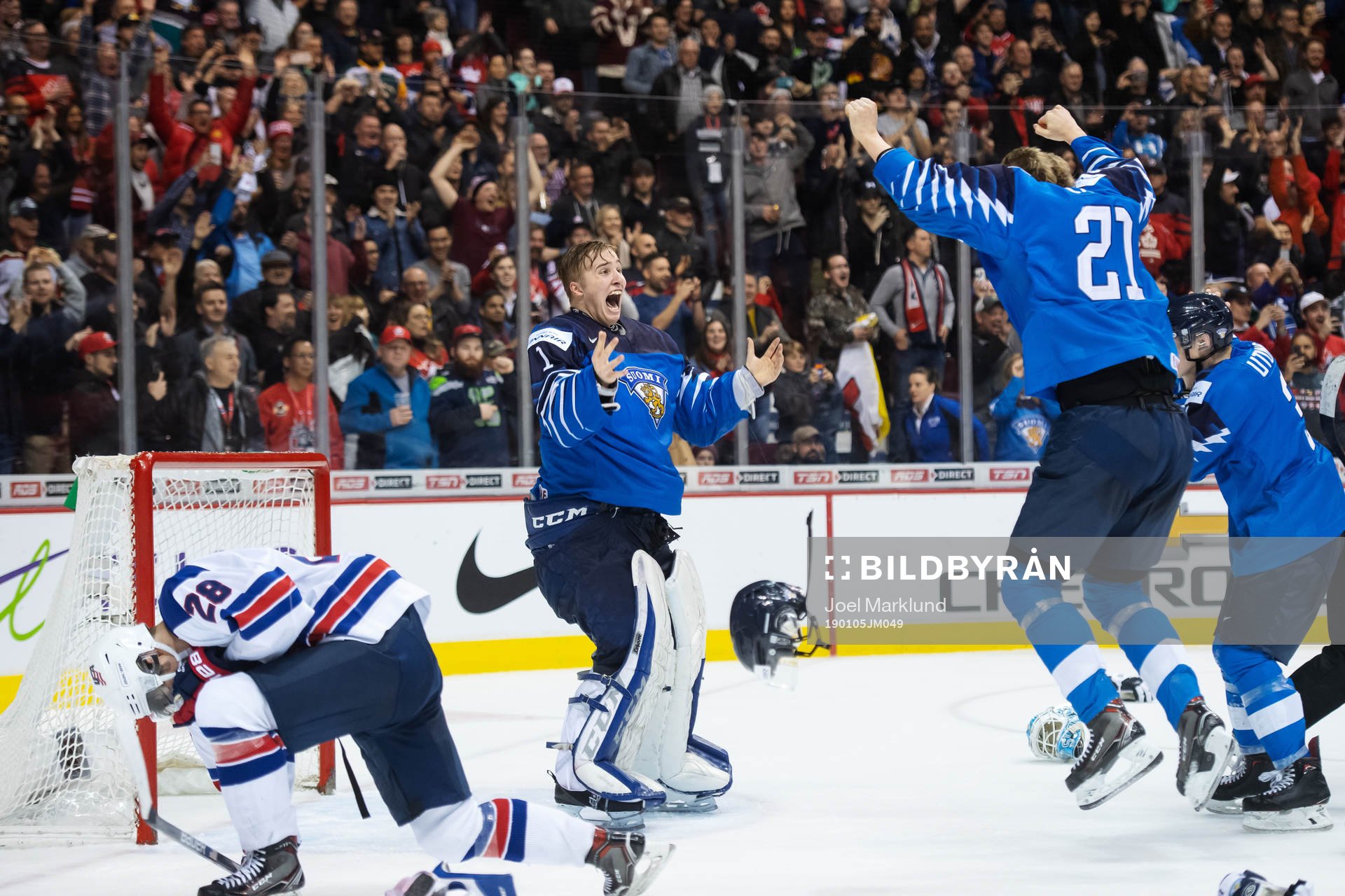 Goaltender Ukko-Pekka Luukkonen of Finland celebrates the