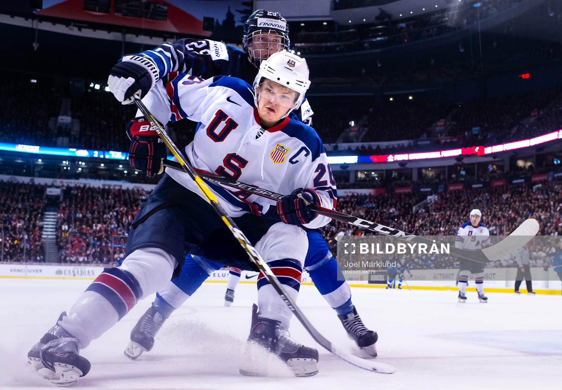 Anton Lundell of Finland and Mikey Anderson of USA