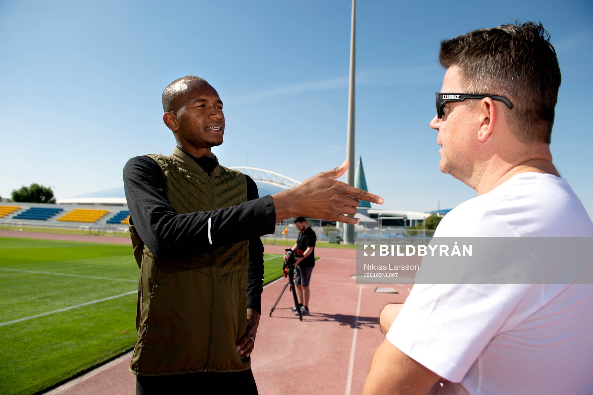 Qatar high jumper Mutaz Essa Barshim talks to journalist