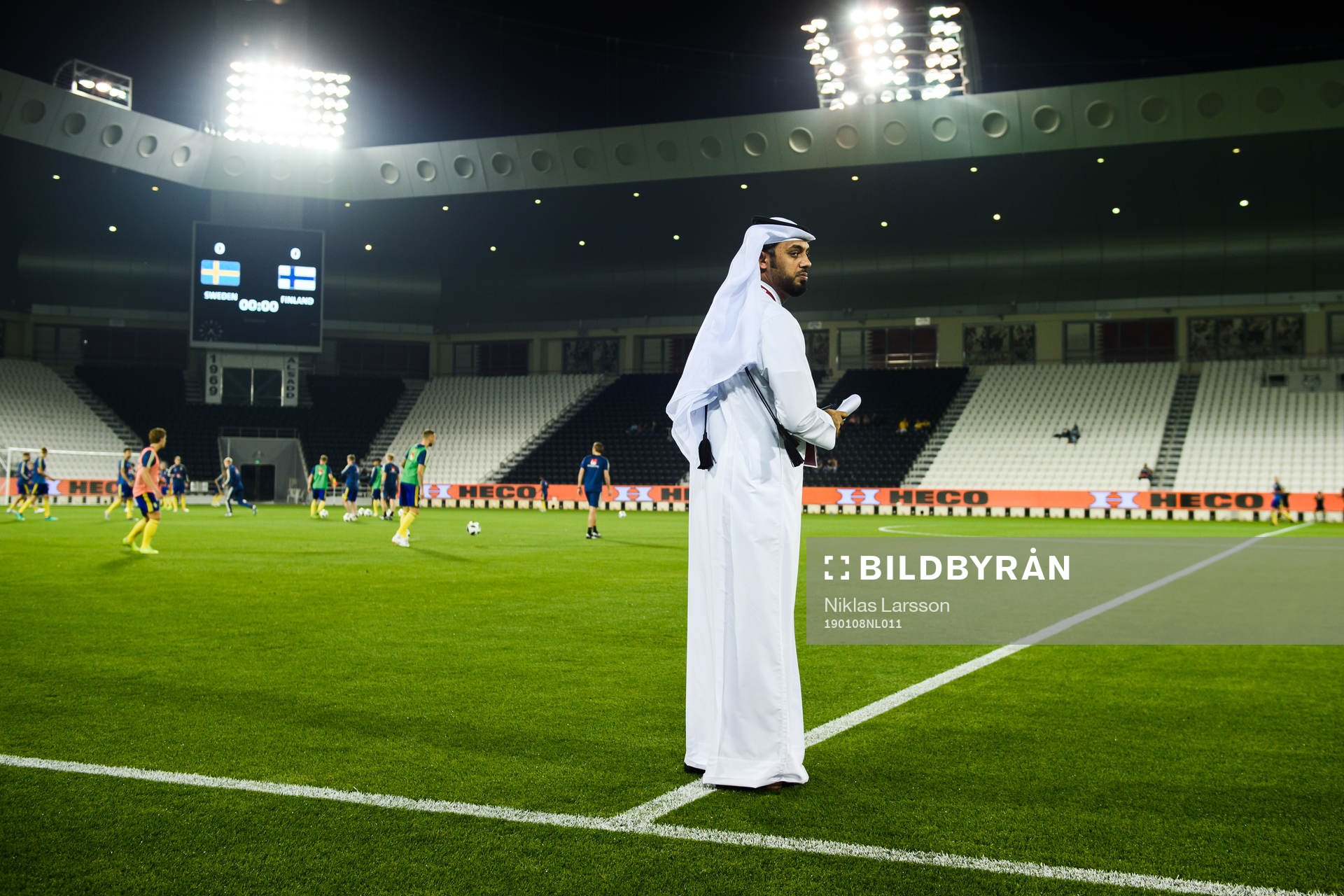 A sheik is watching the warm up