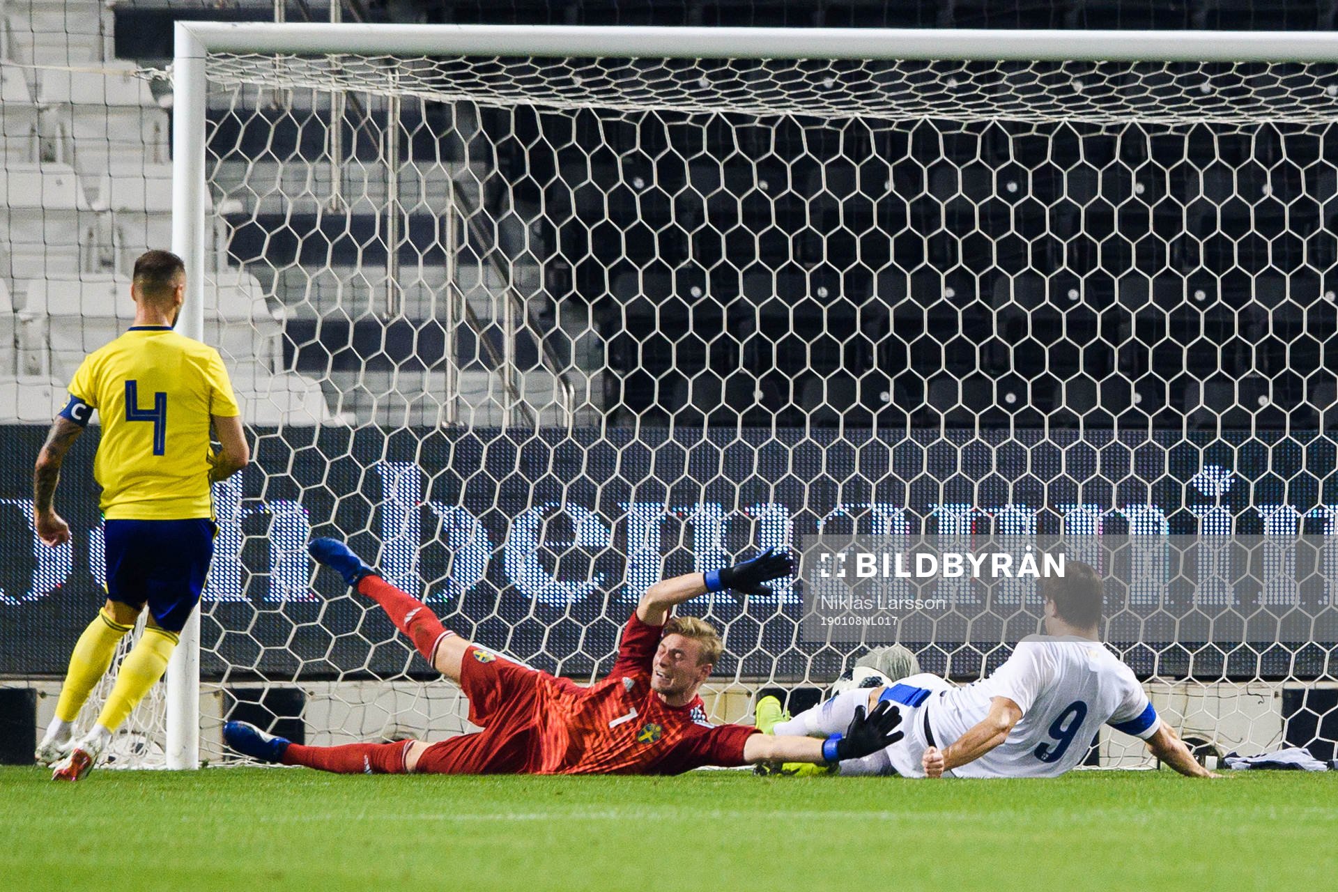 Eero Markkanen of Finland scores 0-1 behind goalkeeper