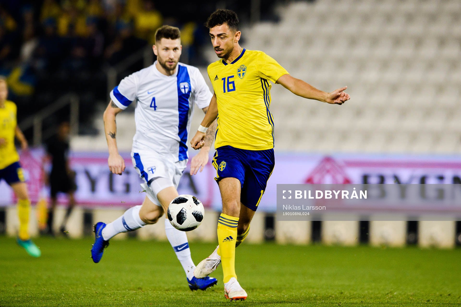 Joona Toivio of Finland and Daleho Irandust of Sweden during the international friendly football match between Sweden and Finland on January 8, 2019 in Doha.