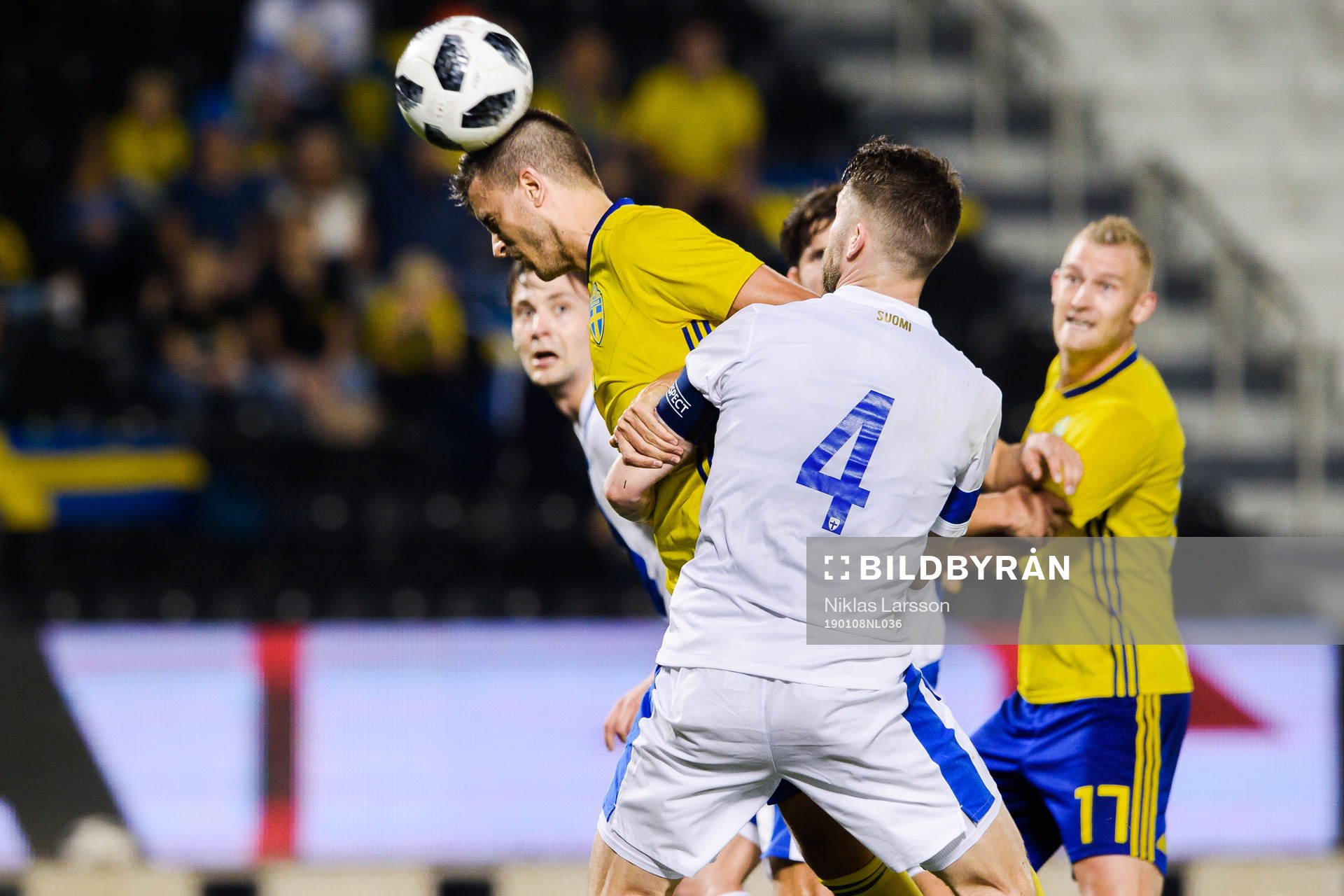 Joona Toivio of Finland in a duel with Alexander Jeremejeff of Sweden during the international friendly football match between Sweden and Finland on January 8, 2019 in Doha.