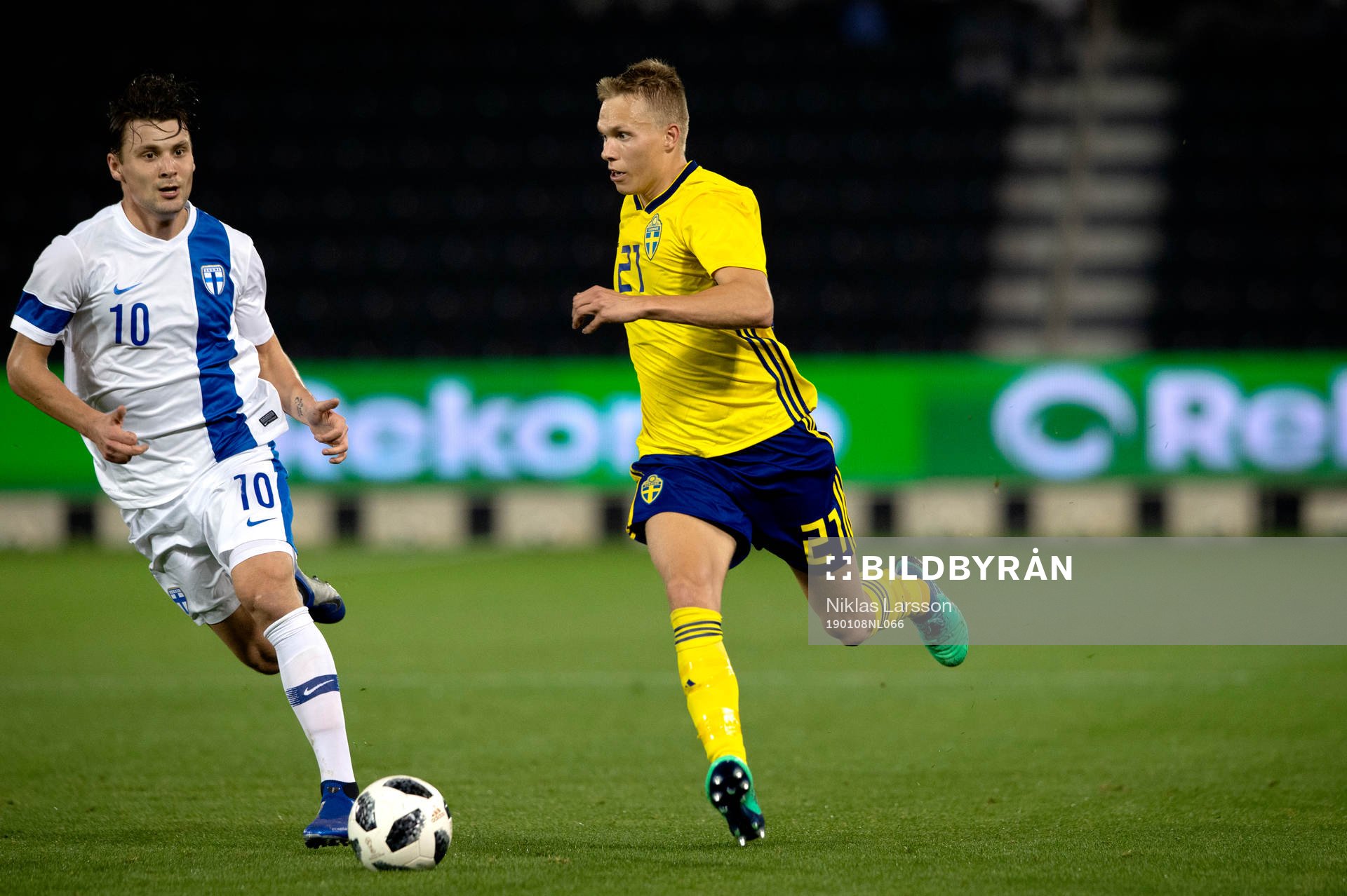 Finland's Kaan Kairinen and Sweden's Jonathan Augustinsson during the international friendly football match between Sweden and Finland on January 8, 2019 in Doha.