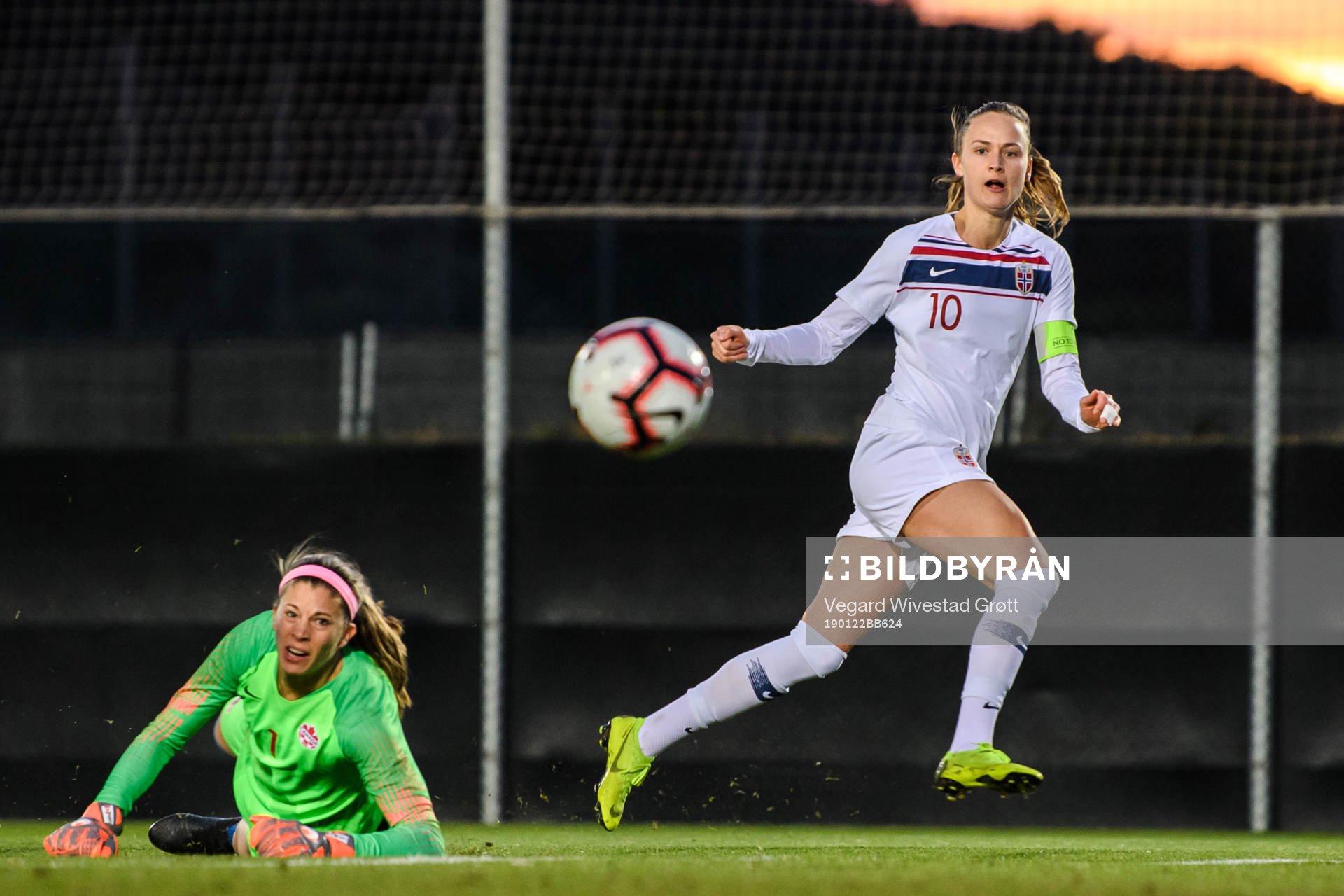 Goalkeeper Stephanie Labbe of Canada and Caroline Graham