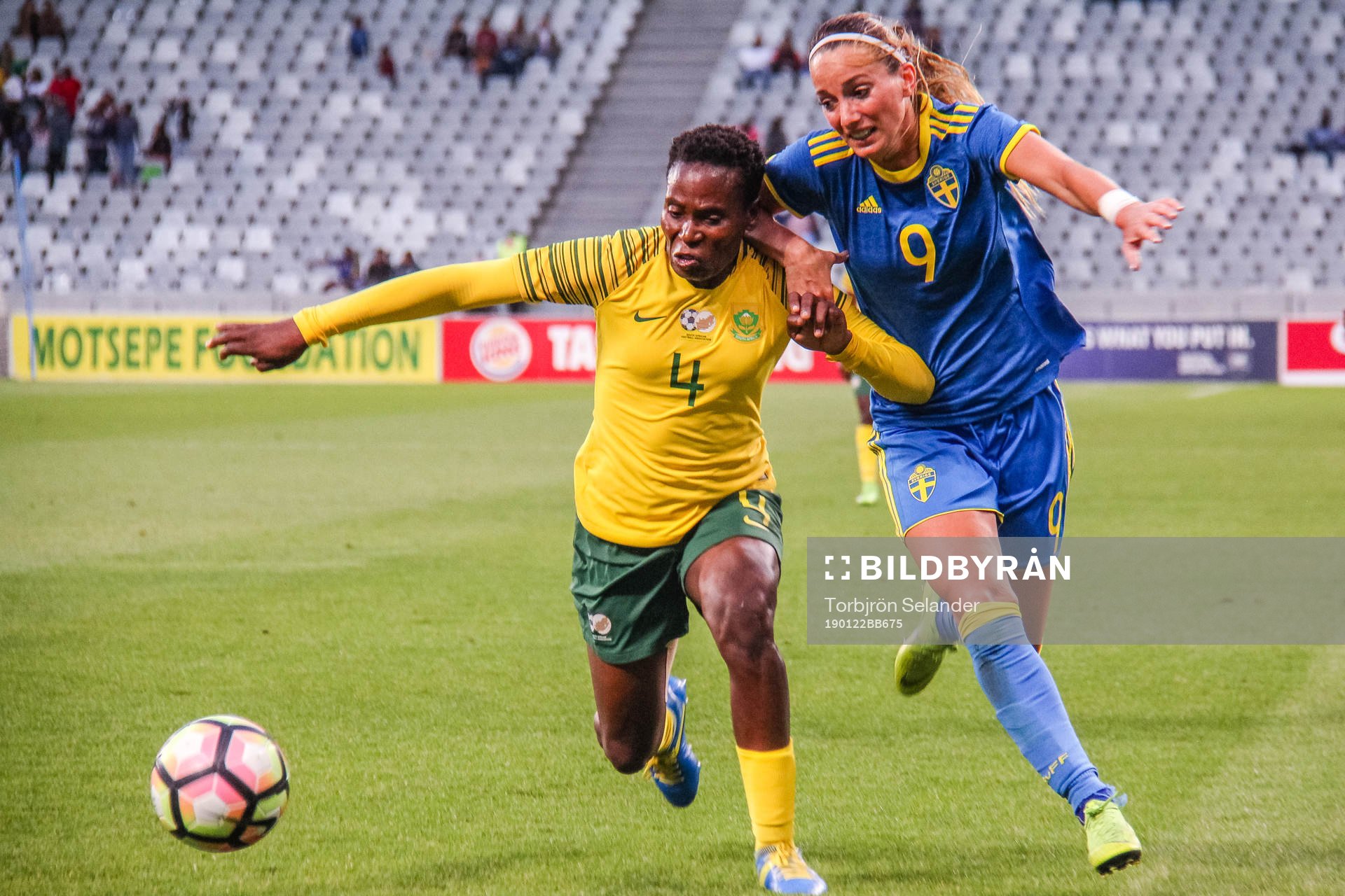 Noko Matlou of South Africa and Kosovare Asllani of Sweden