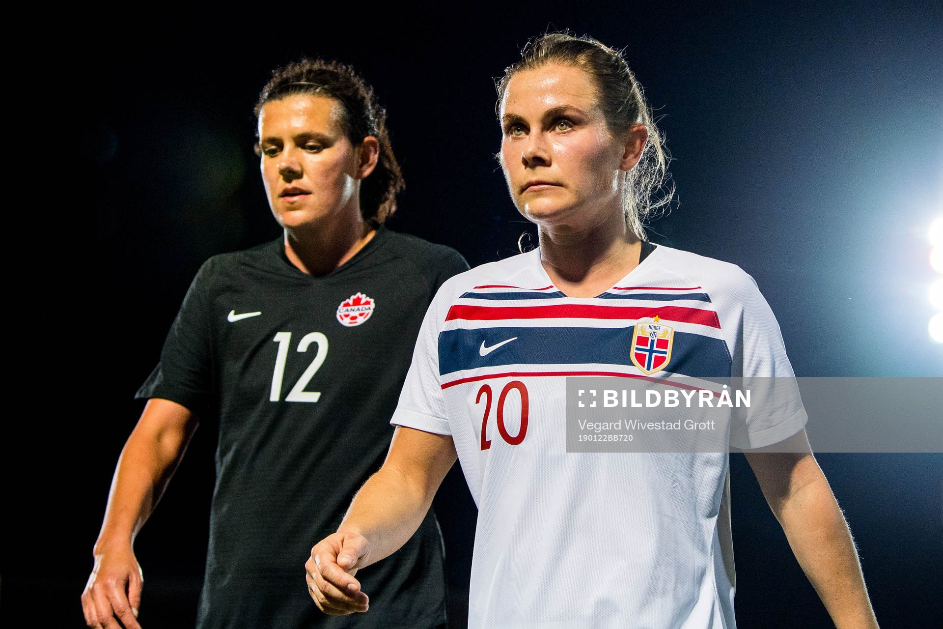 Christine Sinclair of Canada and Emilie Bosshard Haavi of