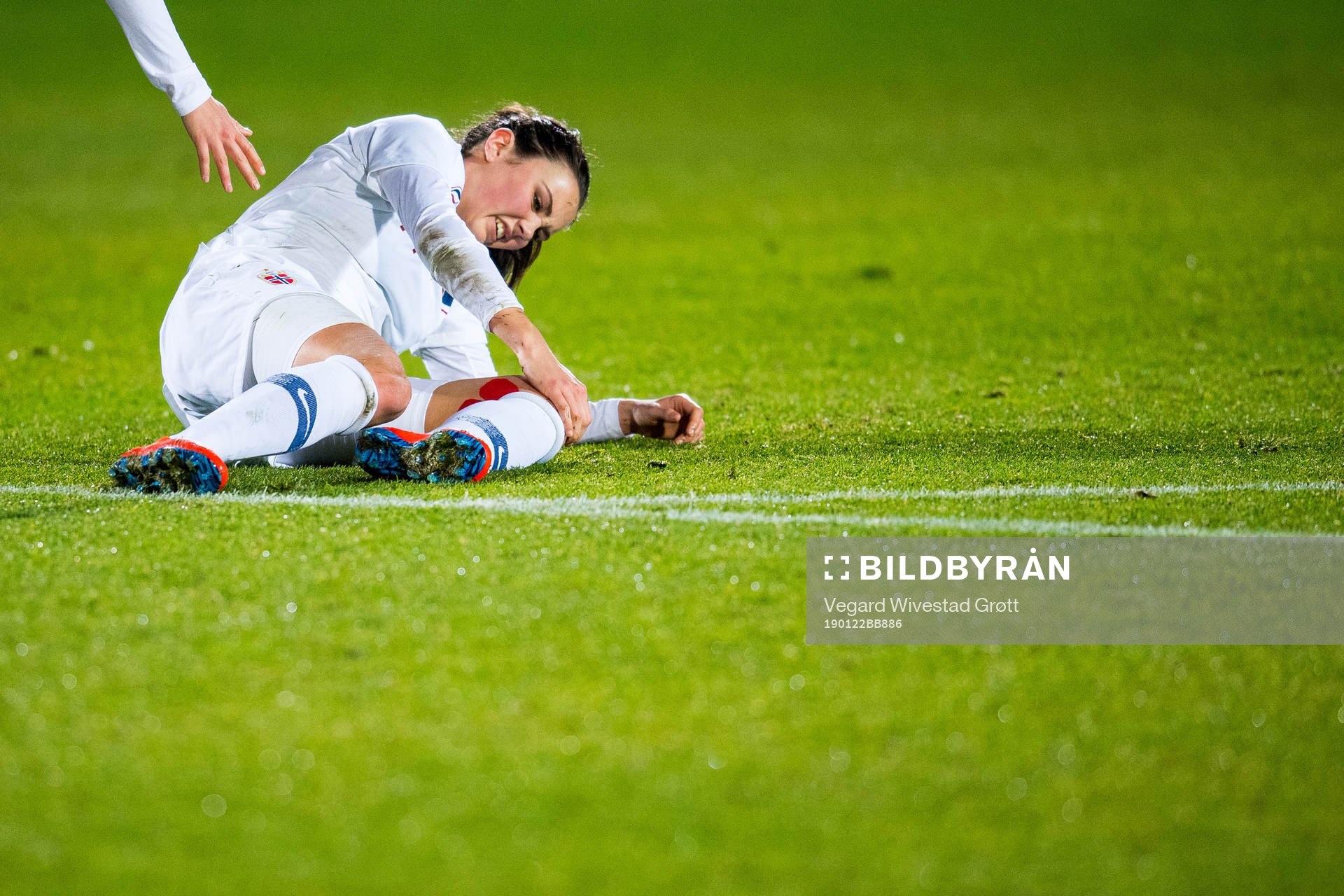 Ingrid Syrstad Engen of Norway lies down with an injury