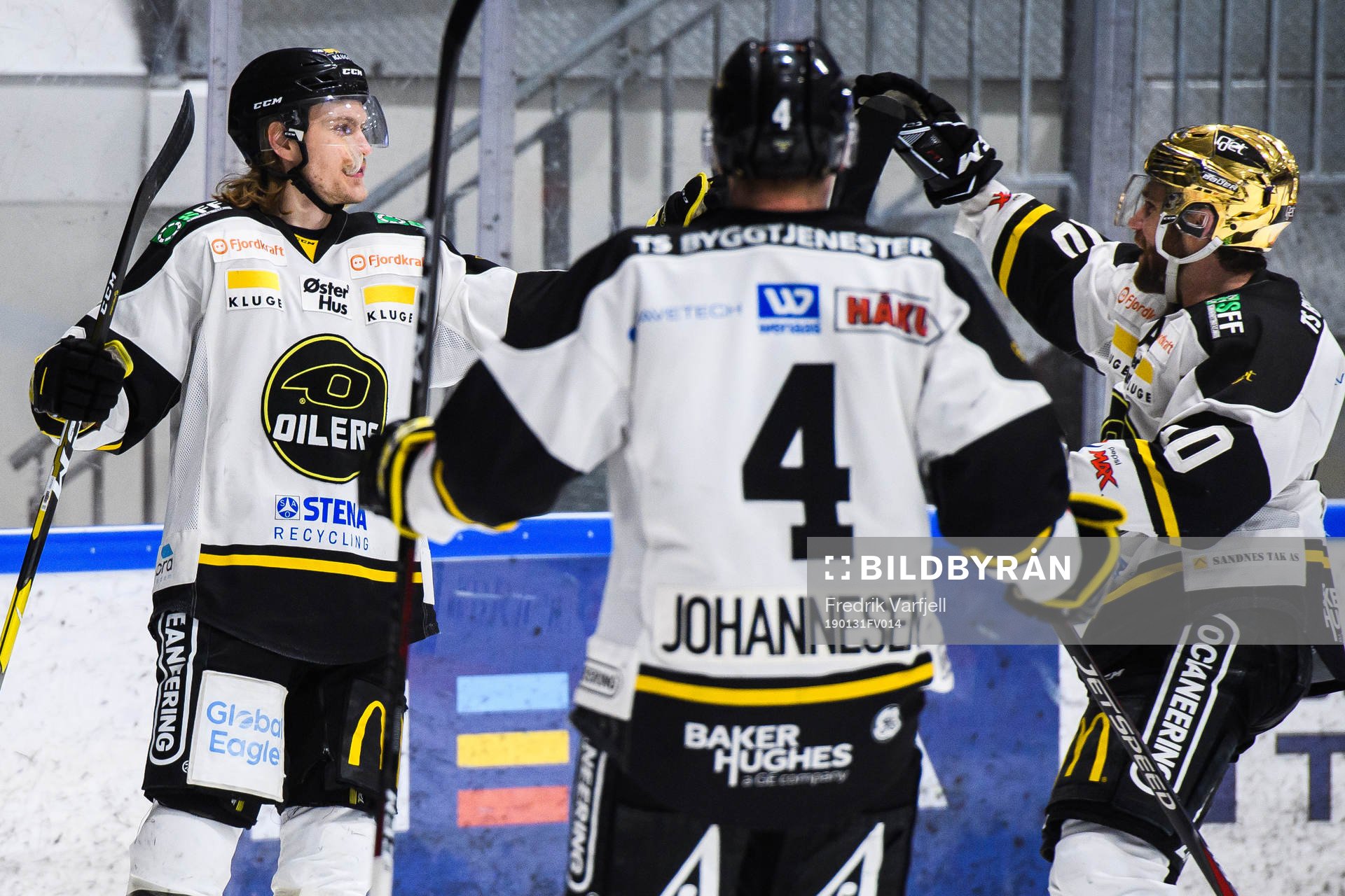 Mario Lucia celebrates with Johannes Johannesen and Jacob
