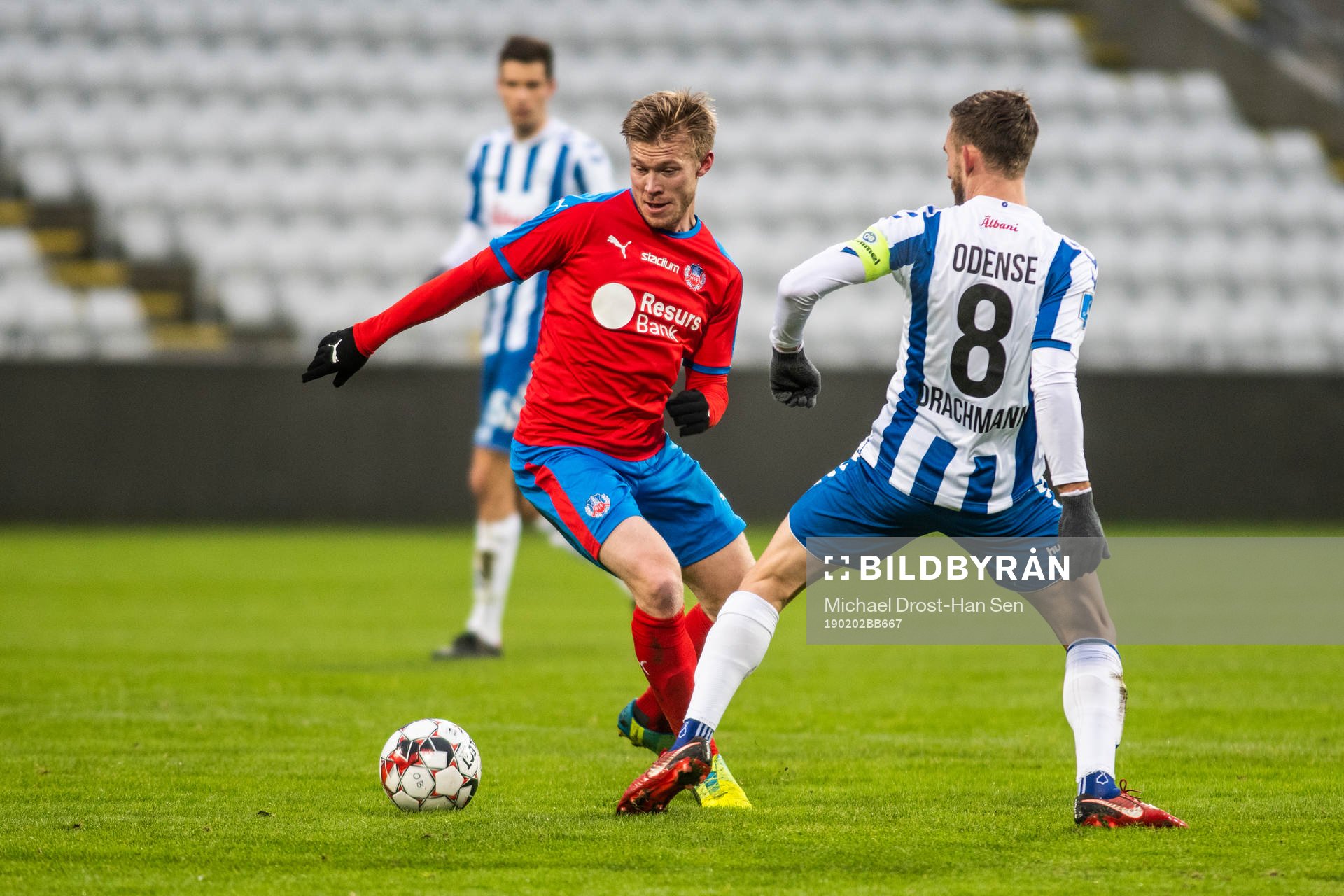 Helsingborgs Andreas Landgren och Odenses Janus Drachmann under träningsmatchen i fotboll mellan Odense och Helsingborg den 2 februari 2019 i Odense.