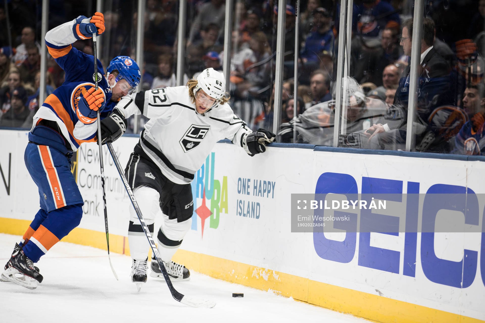 Devon Toews of New York Islanders and Carl Hagelin of Los