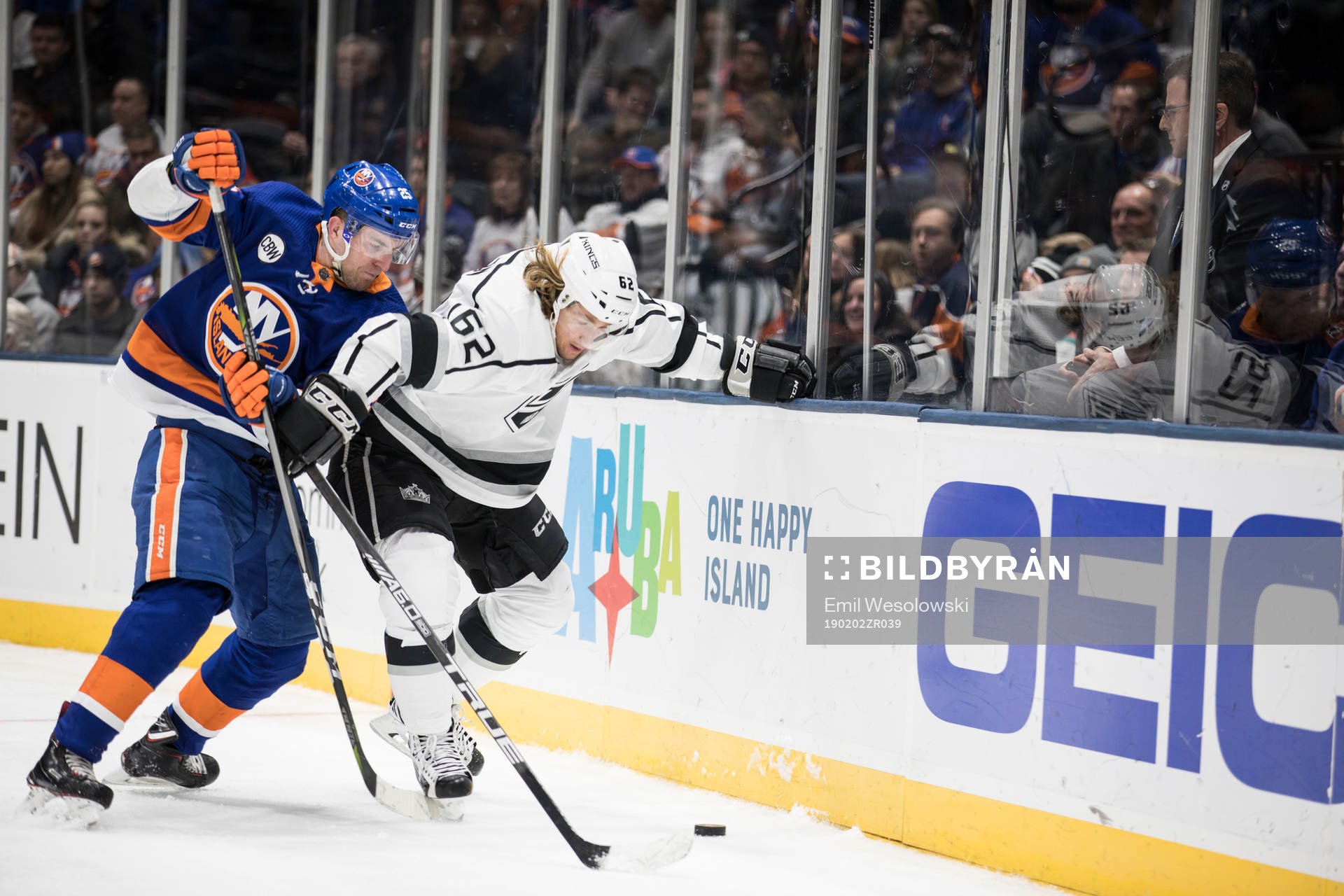 Devon Toews of New York Islanders and Carl Hagelin of Los