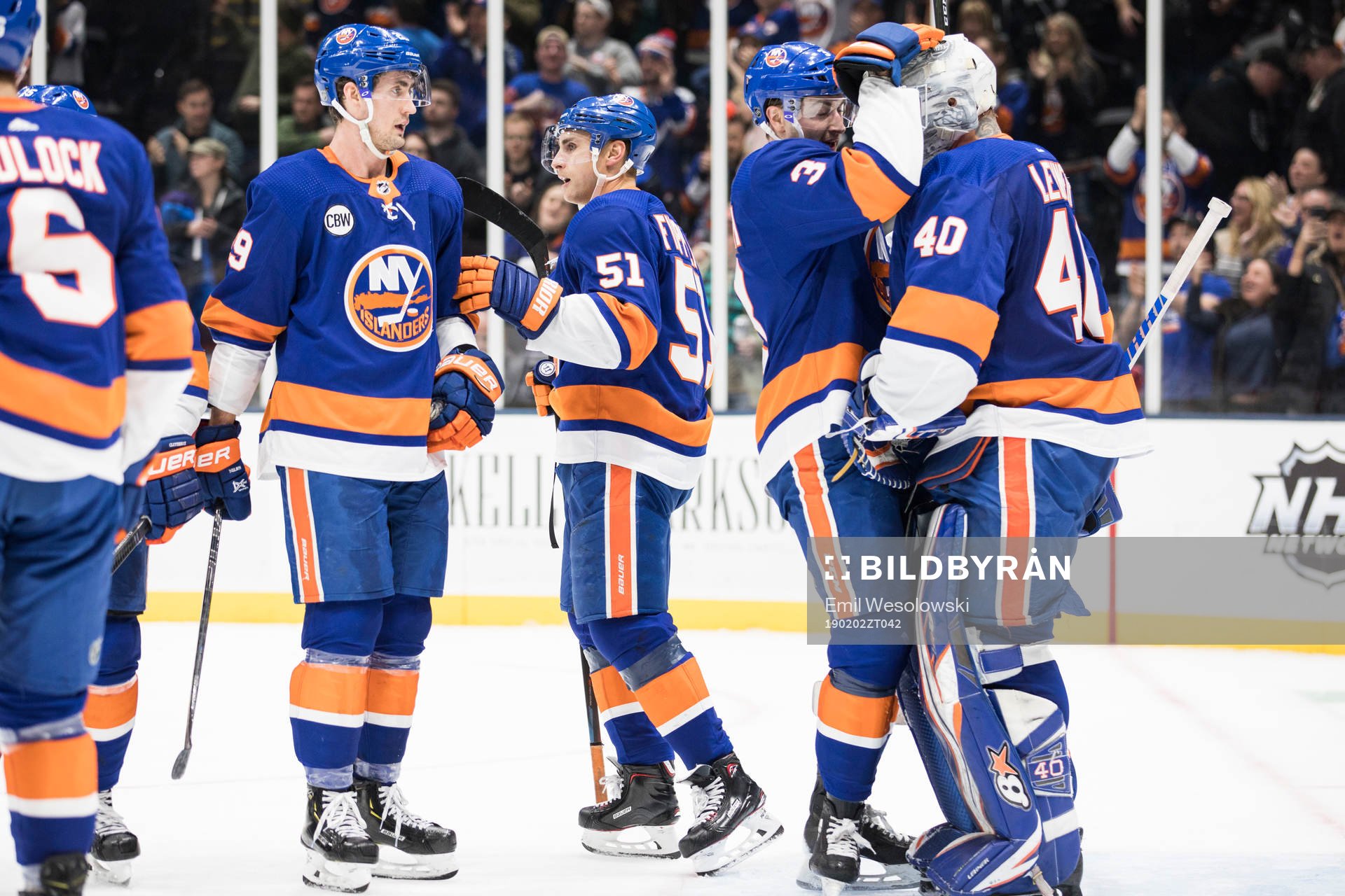 Adam Pelech and goalkeeper Robin Lehner of New York