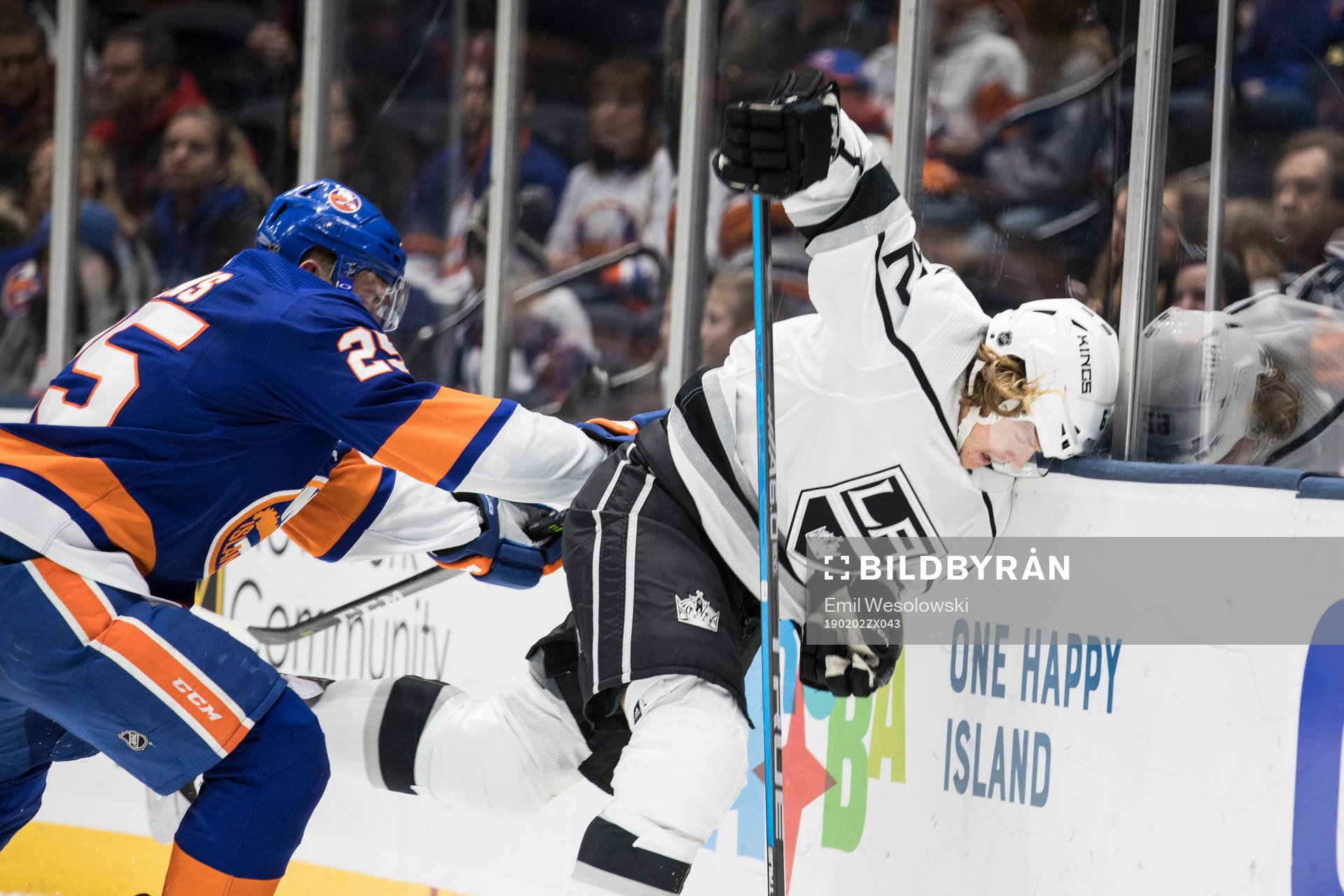 Devon Toews of New York Islanders and Carl Hagelin of Los