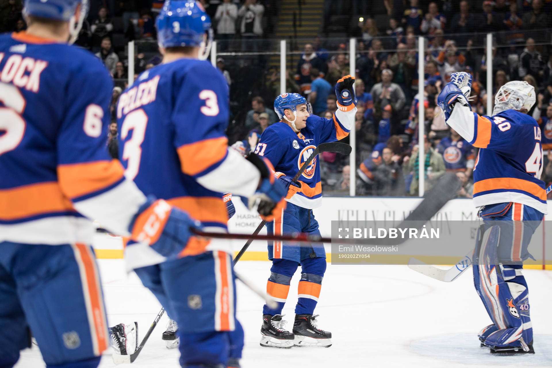 Valtteri Filppula and goalkeeper Robin Lehner celebrate