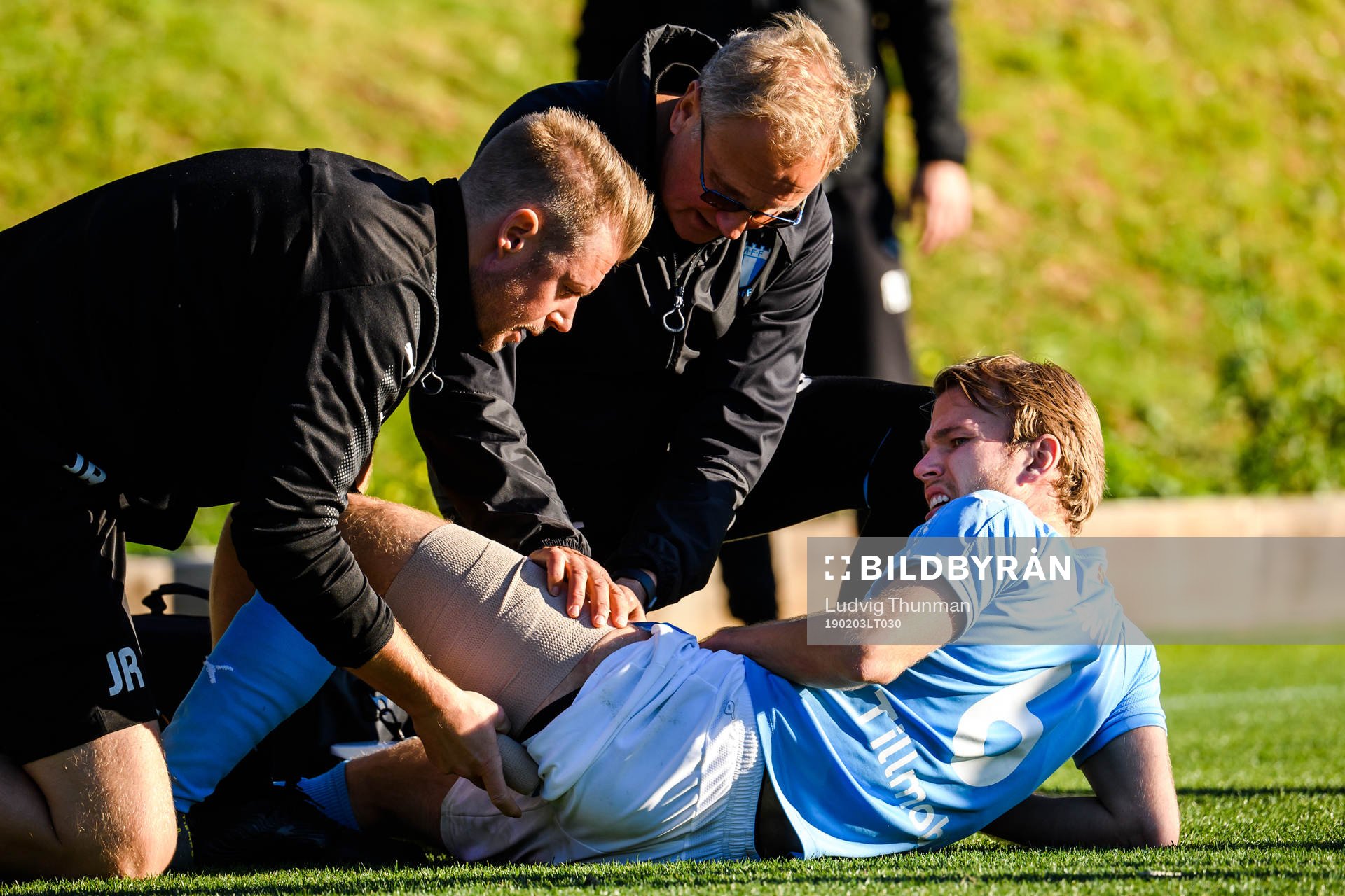 Oscar Lewicki of Malmö FF receives treatment