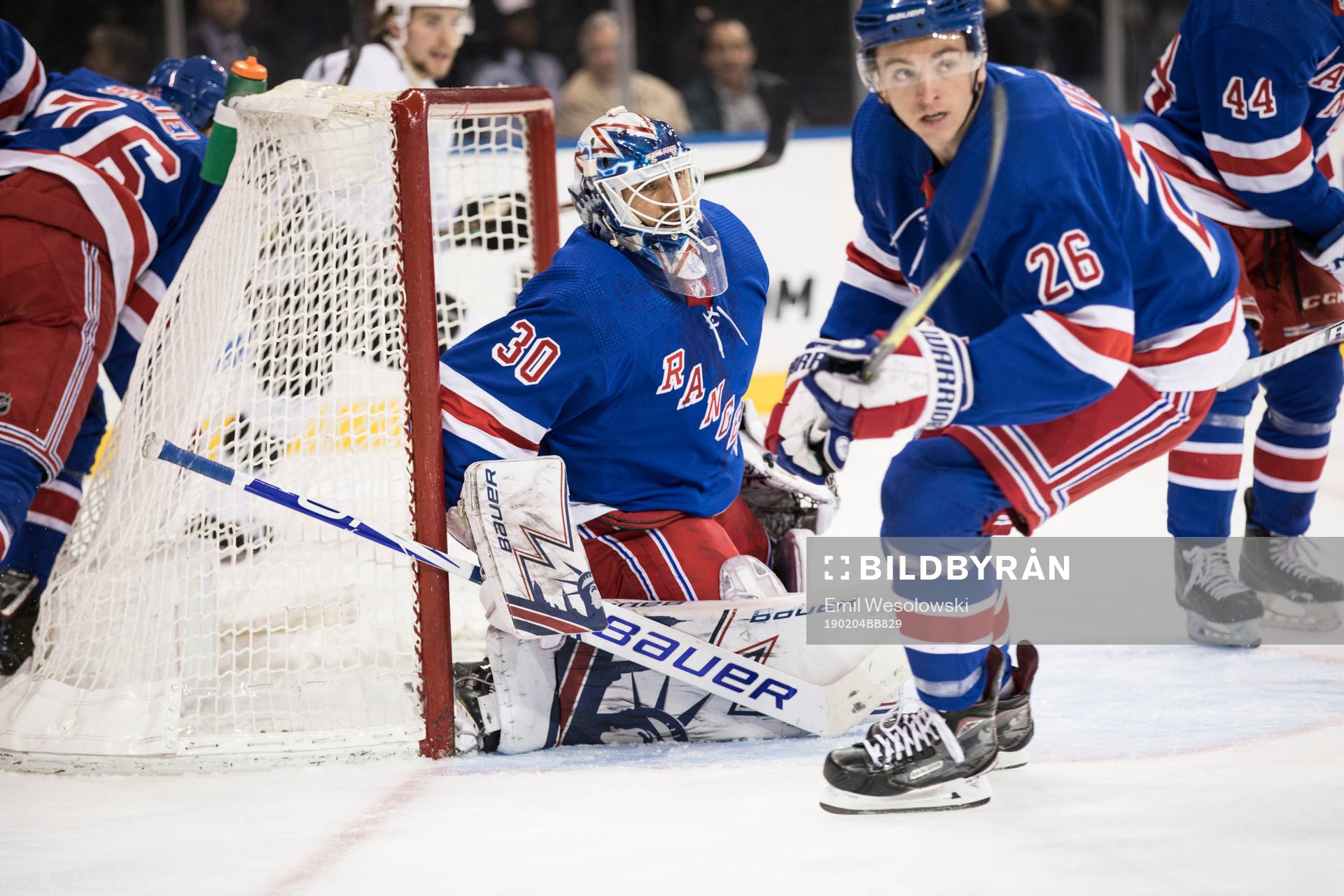 Goaltender Henrik Lundqvist, Jimmy Vesey and Neal Pionk