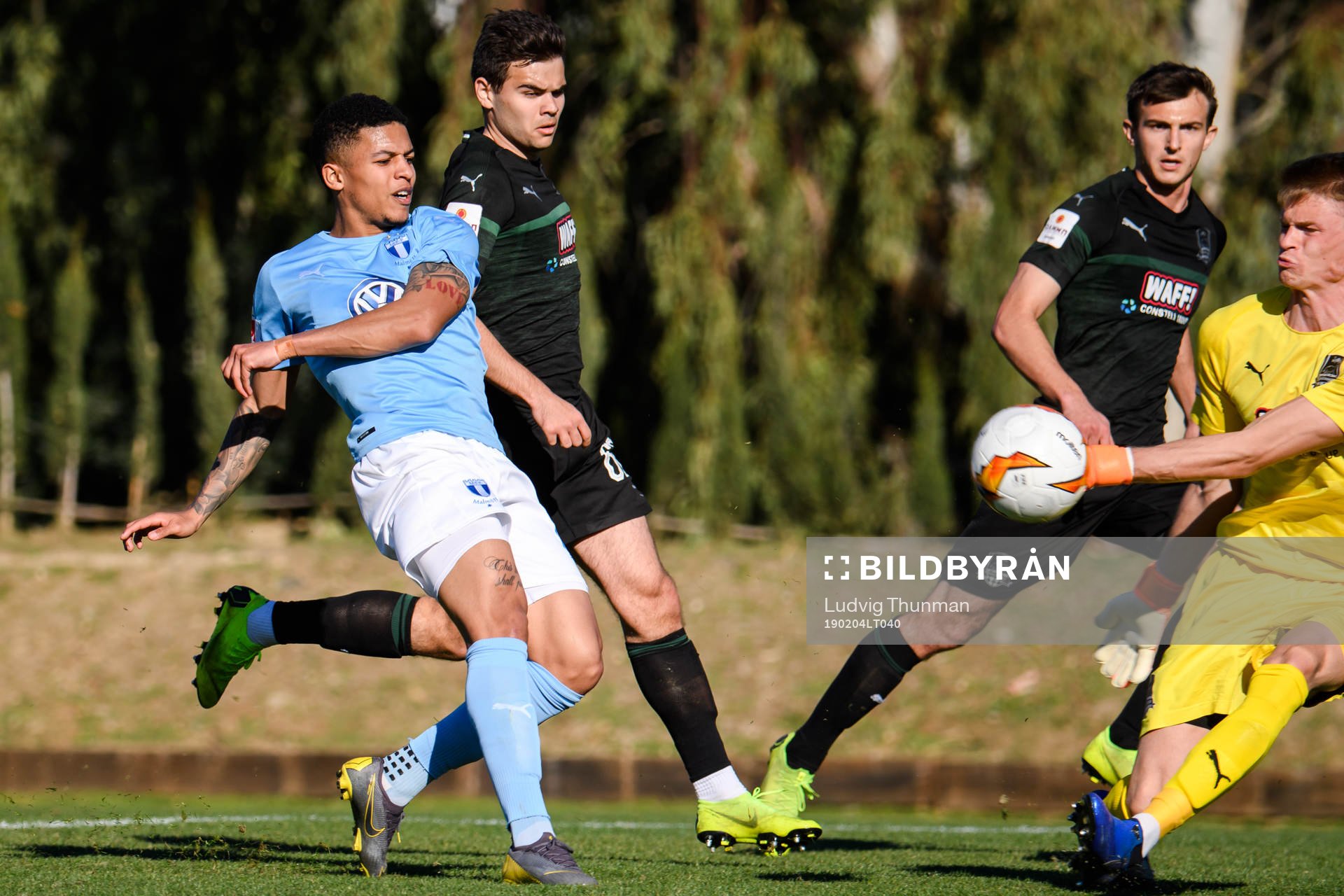 Romain Gall of Malmö FF against goalkeeper Denis Adamov