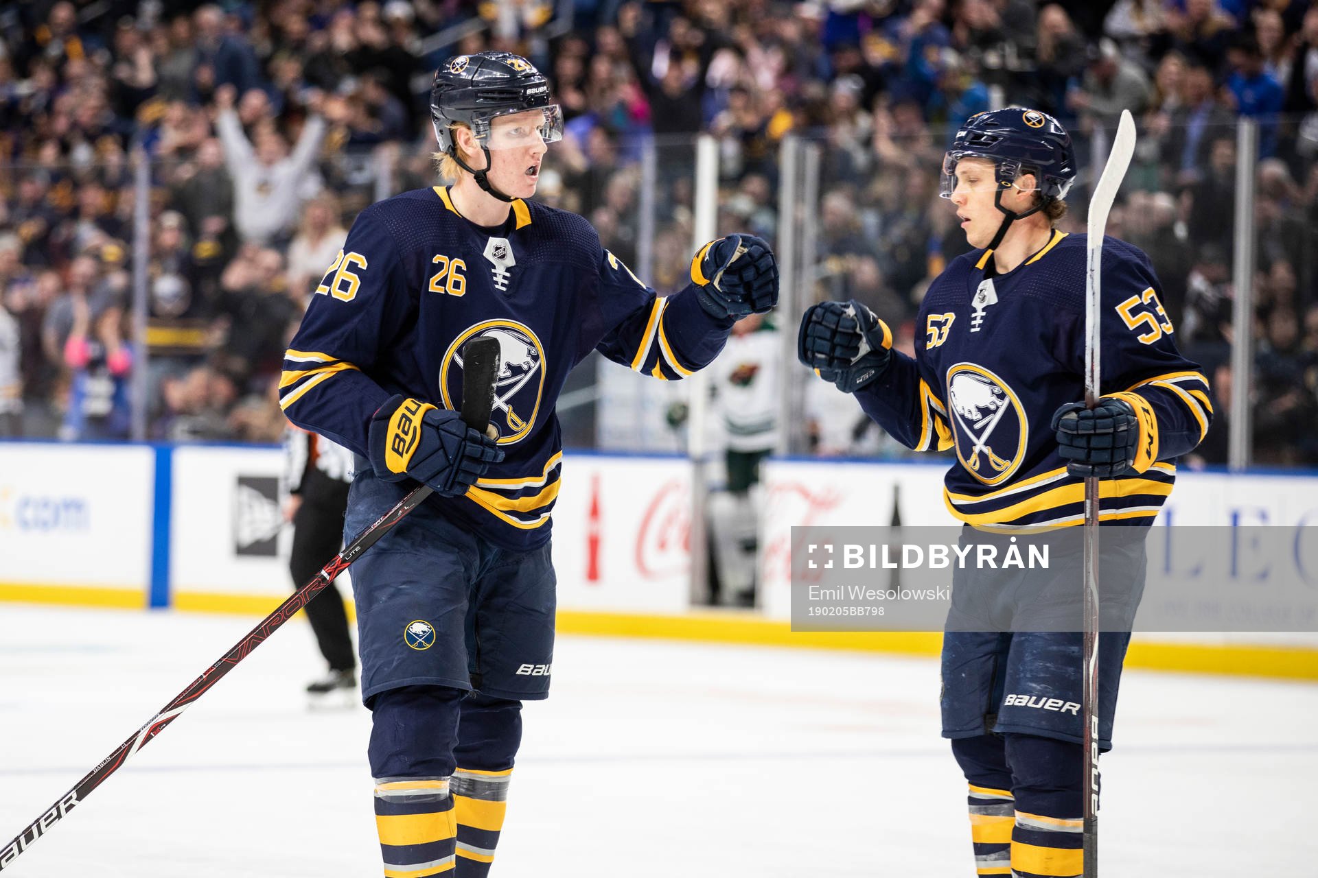 Rasmus Dahlin fist-bumps Jeff Skinner