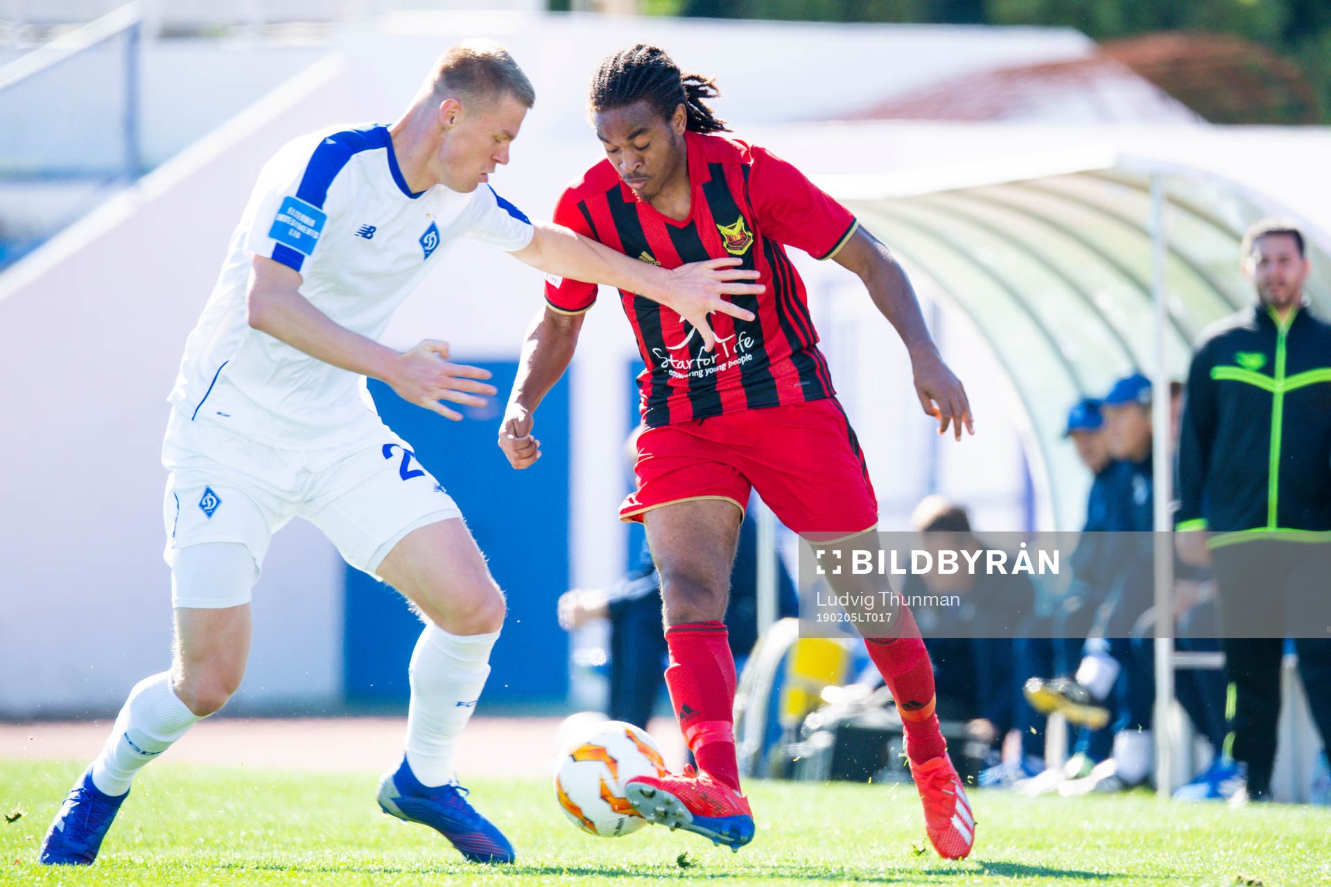 Evgen Burda of Dinamo Kiev and Francis Jno-Baptiste of