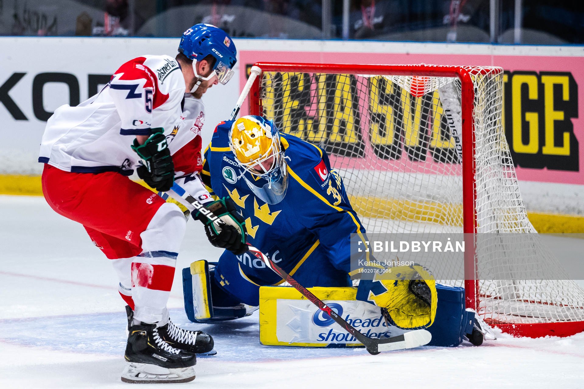 Goaltender Magnus Hellberg of Sweden saves a penalty