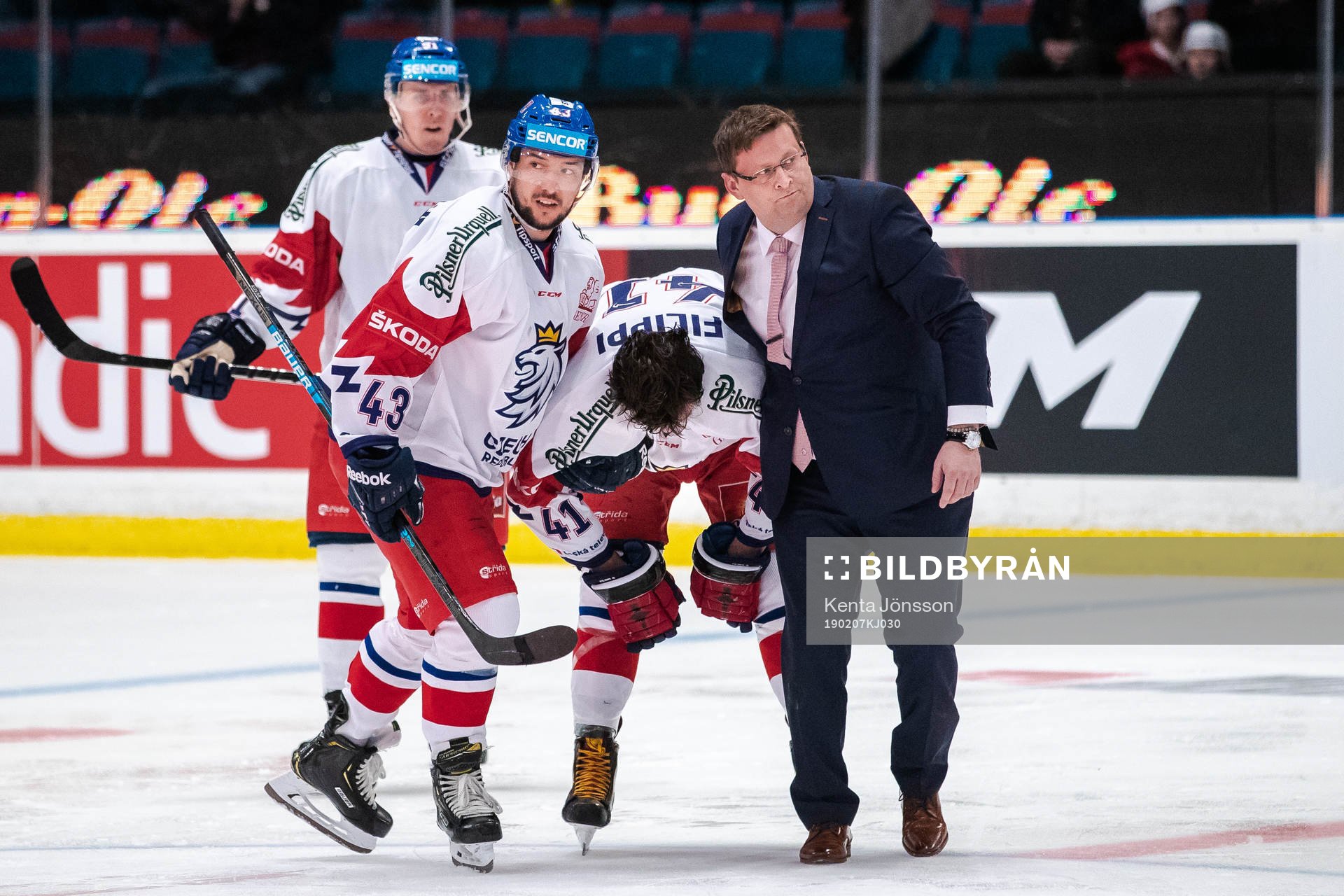 Tomas Filippi of Czech Republic receives help off the ice