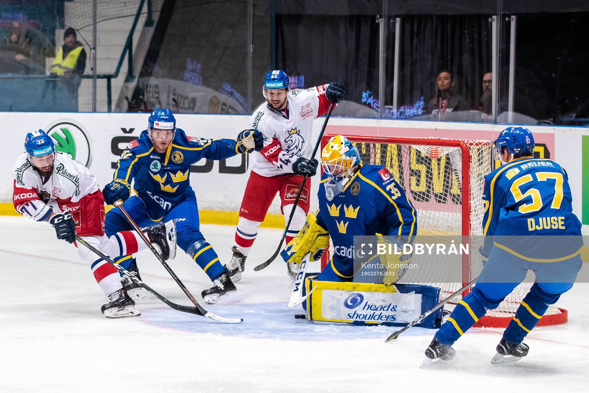 Milan Gulas of Czech Republic scores 3-1 behind goaltender