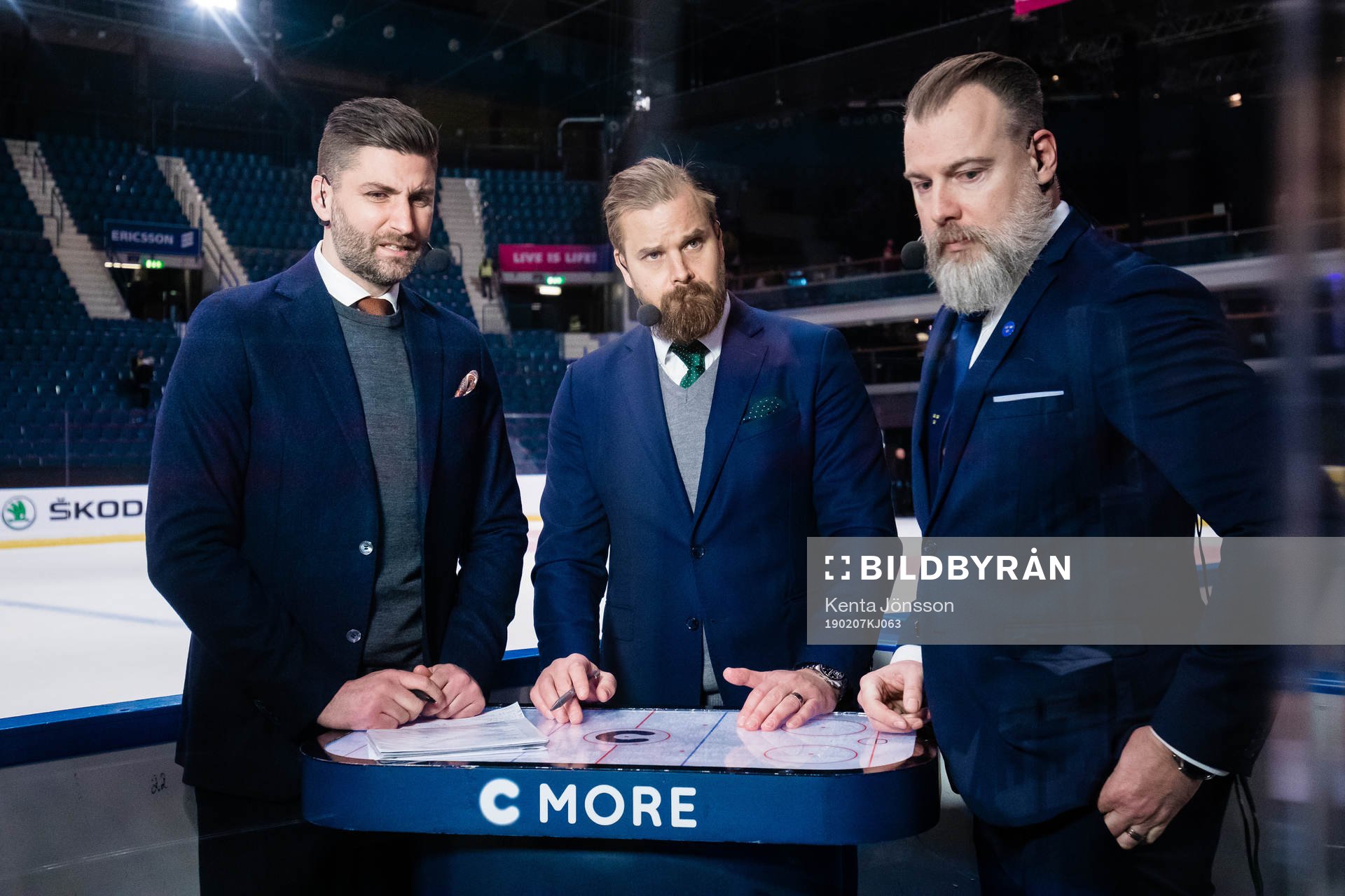 Björn Olden and Sanny Lindström of Cmore with head coach