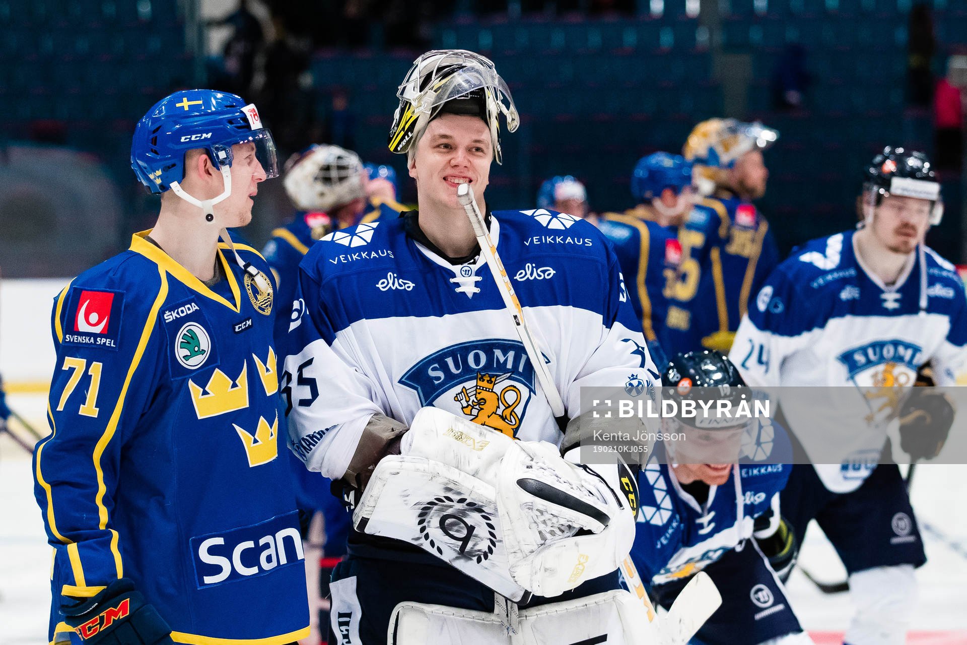 Jonathan Davidsson of Sweden and  goaltender Veini