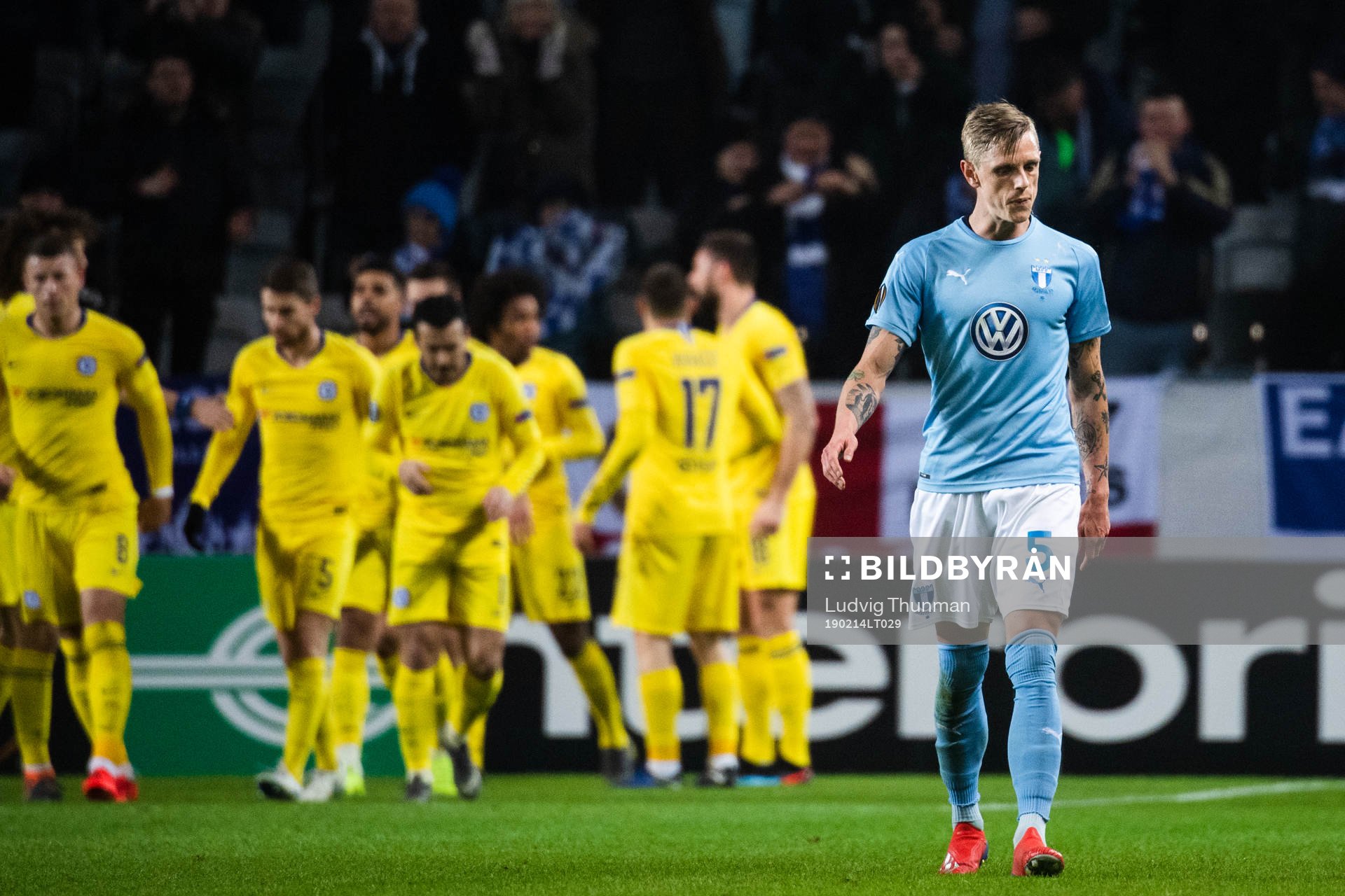 Sören Rieks of Malmö FF looks dejected while players of